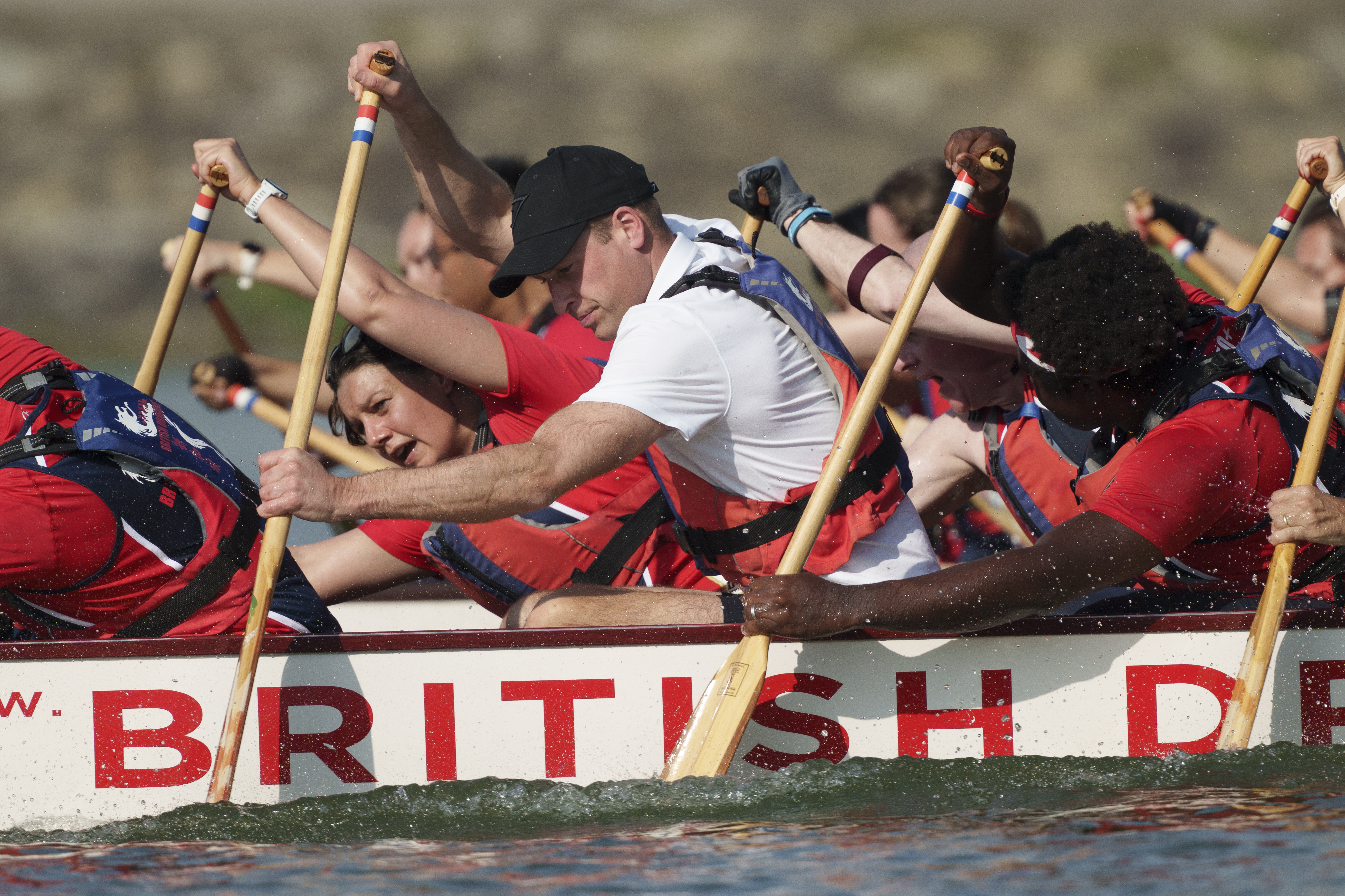 Prince William participates in a dragon boat event in Singapore. Photo / AP