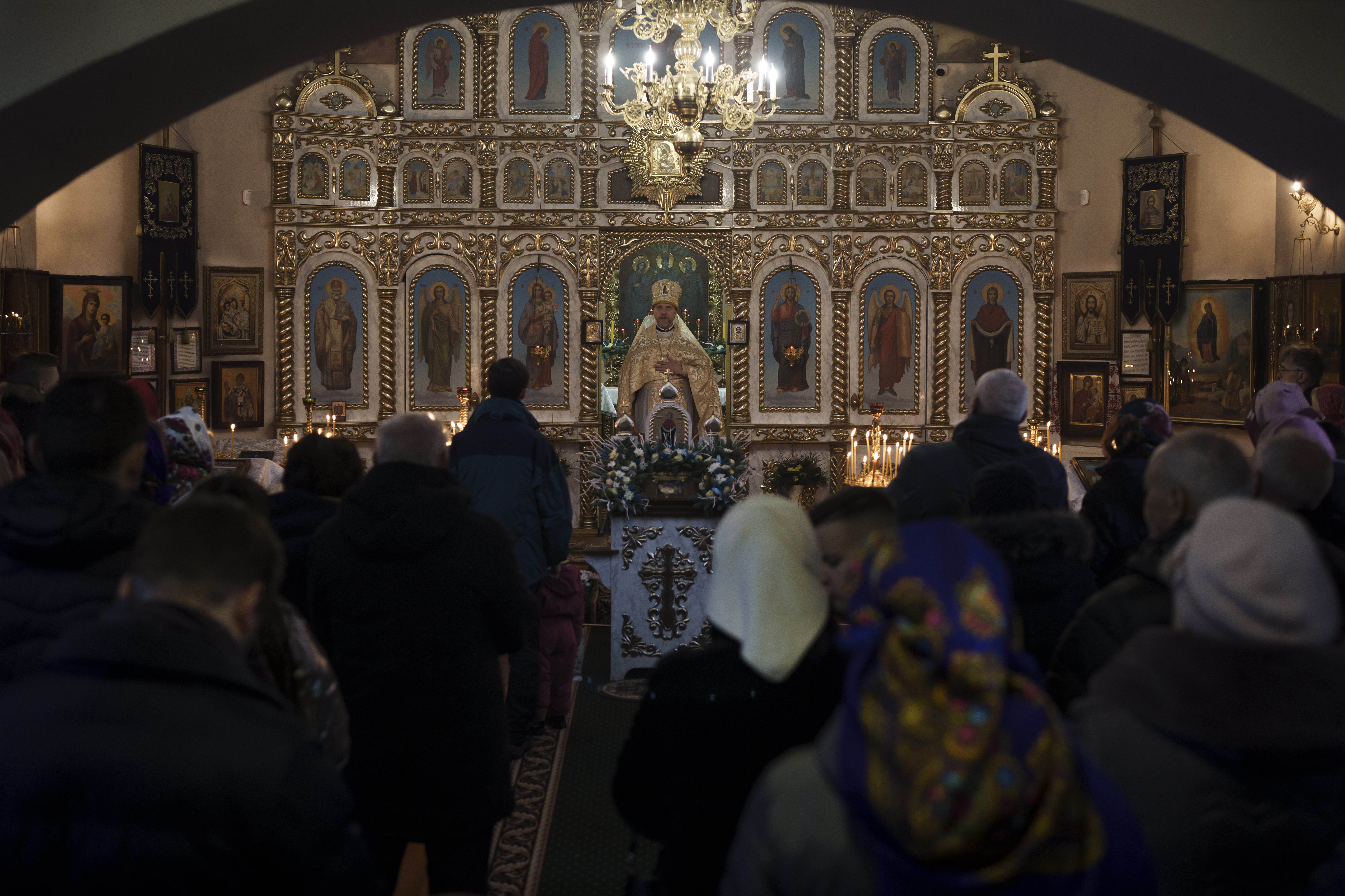 Ukrainians attend a Christmas mass at an Orthodox Church in Bobrytsia on the outskirts of Kyiv, Ukraine. Photo / AP