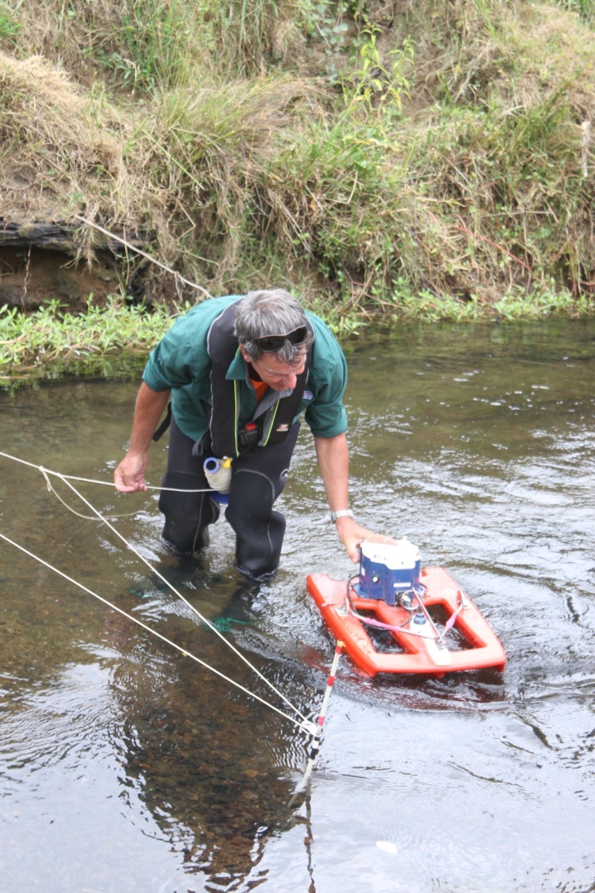 Northland Regional Council hydrologist Alan Bee records the flow in the Awanui River at Double Crossing late last month. It's now so low Level 4 water restrictions have been placed on Kaitaia.