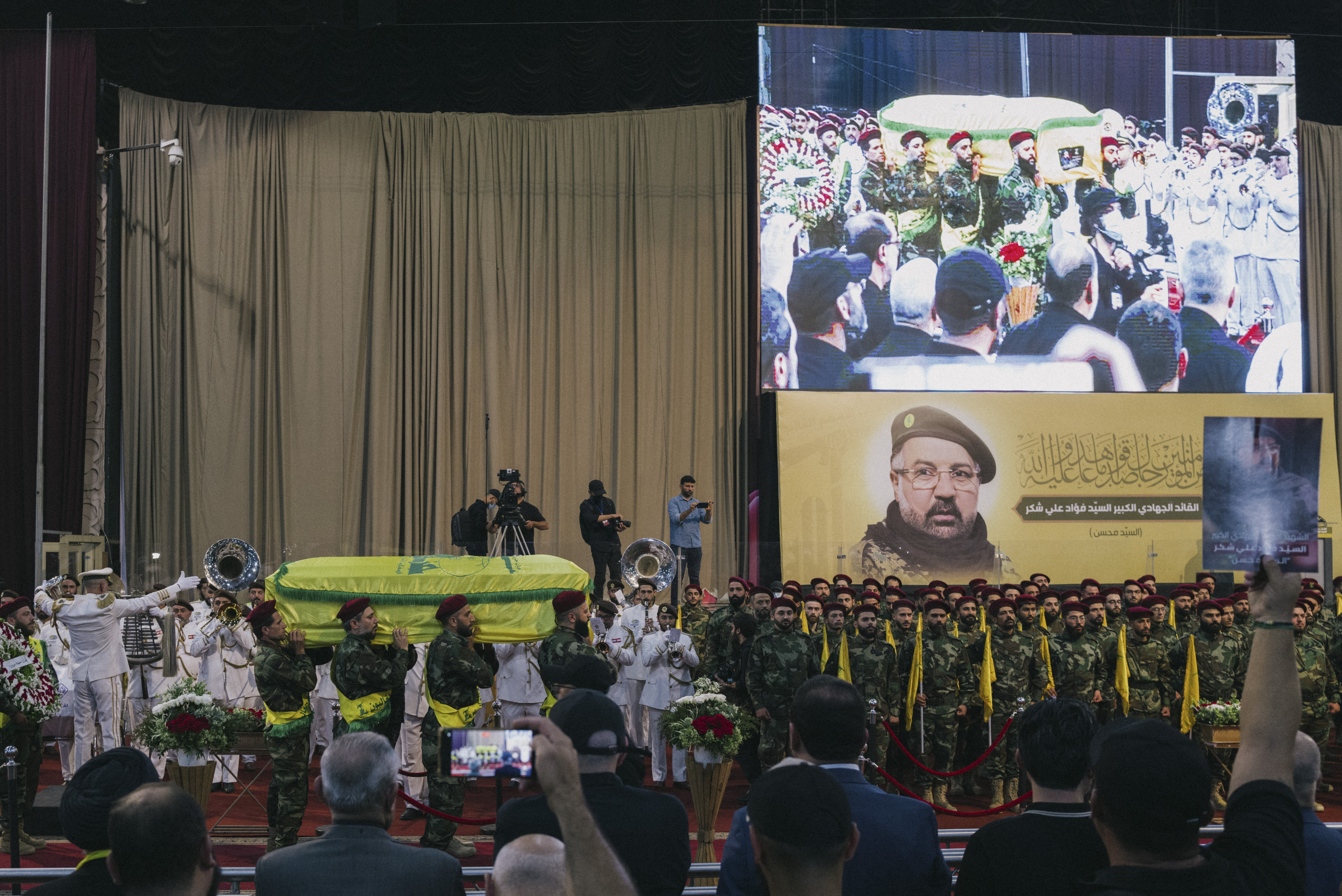 Mourners attend the funeral procession of Hezbollah commander Fuad Shukr, who was killed along with six other people including children in an Israeli airstrike in Beirut. Photo / Lorenzo Tugnoli for The Washington Post