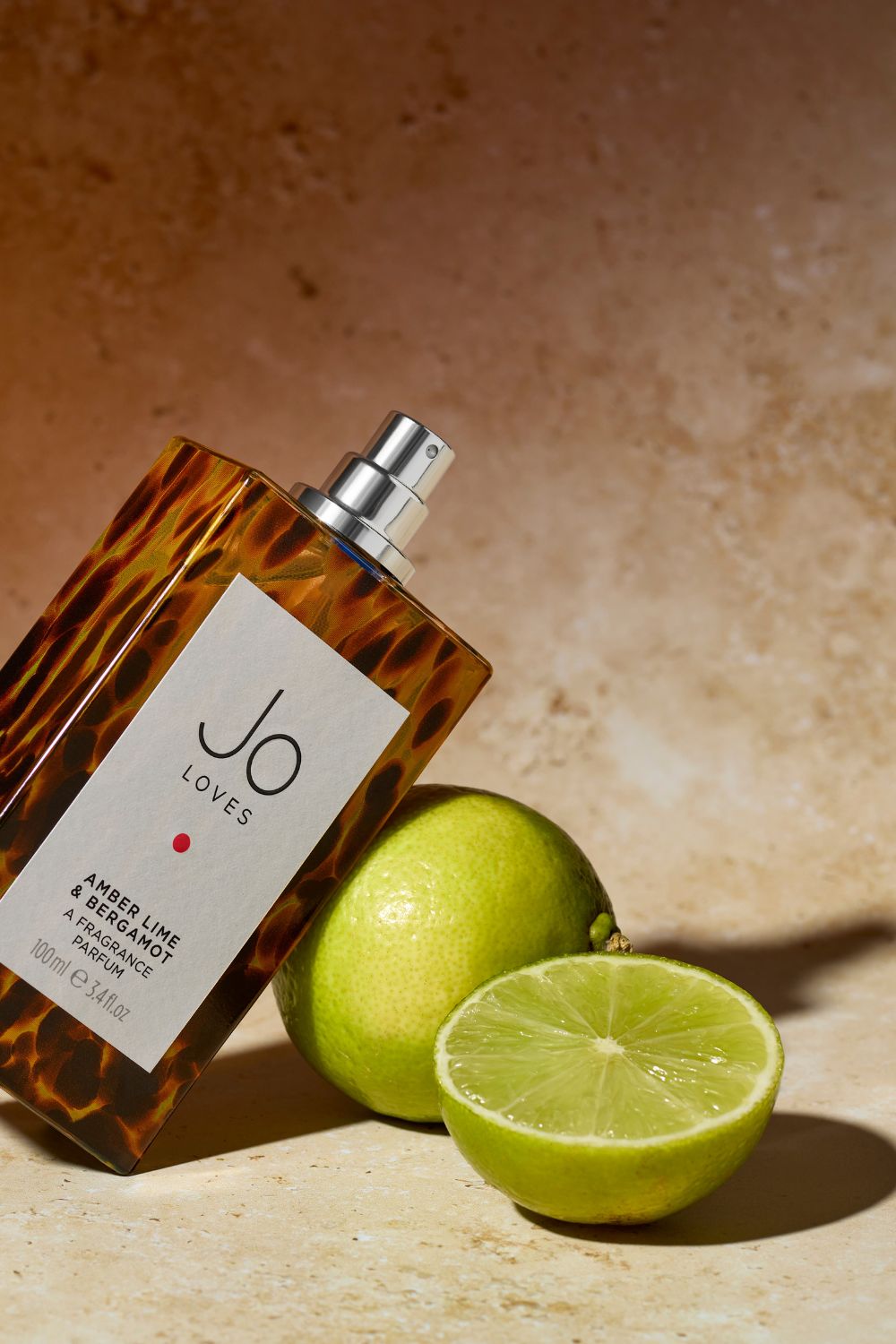 Top notes of juicy citrus shine in Jo Loves' newest scent, alongside warming amber, cedarwood and patchouli.
