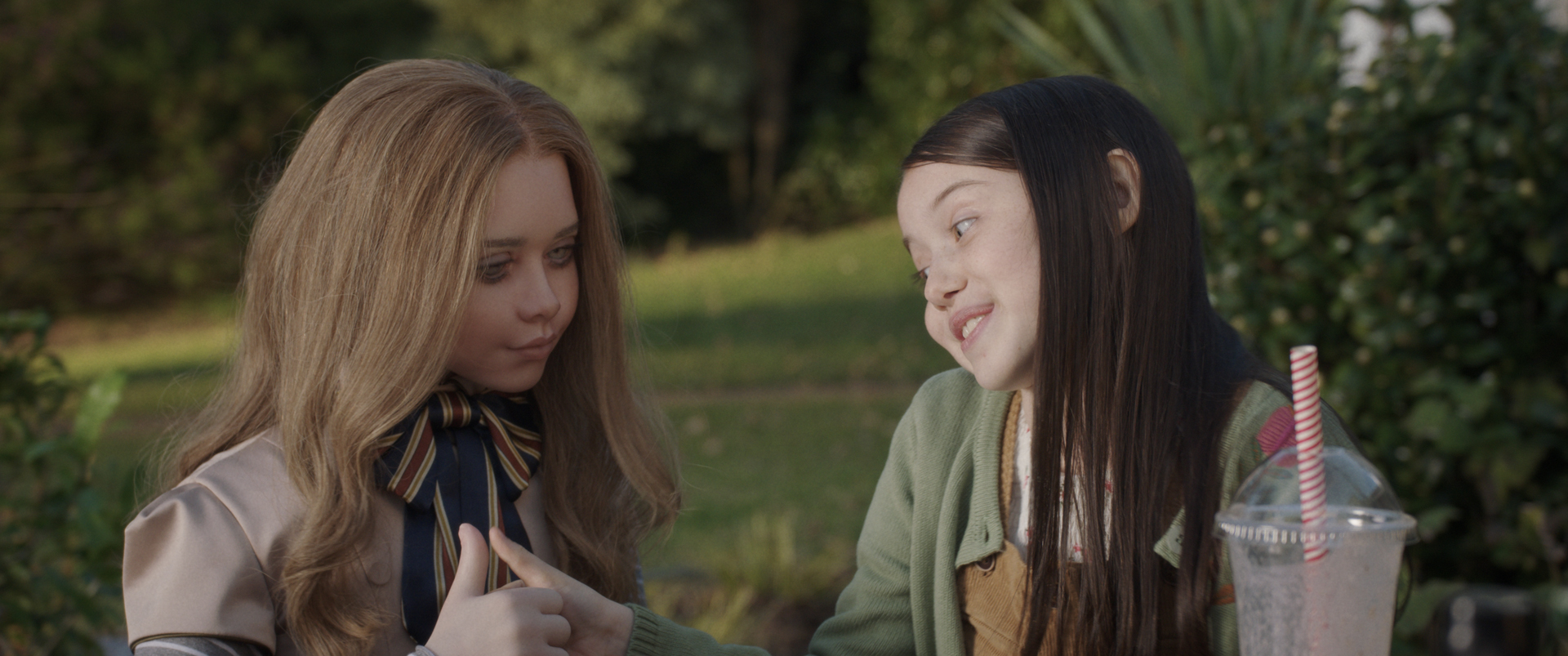 M3GAN and Cady (Violet McGraw) in M3GAN.