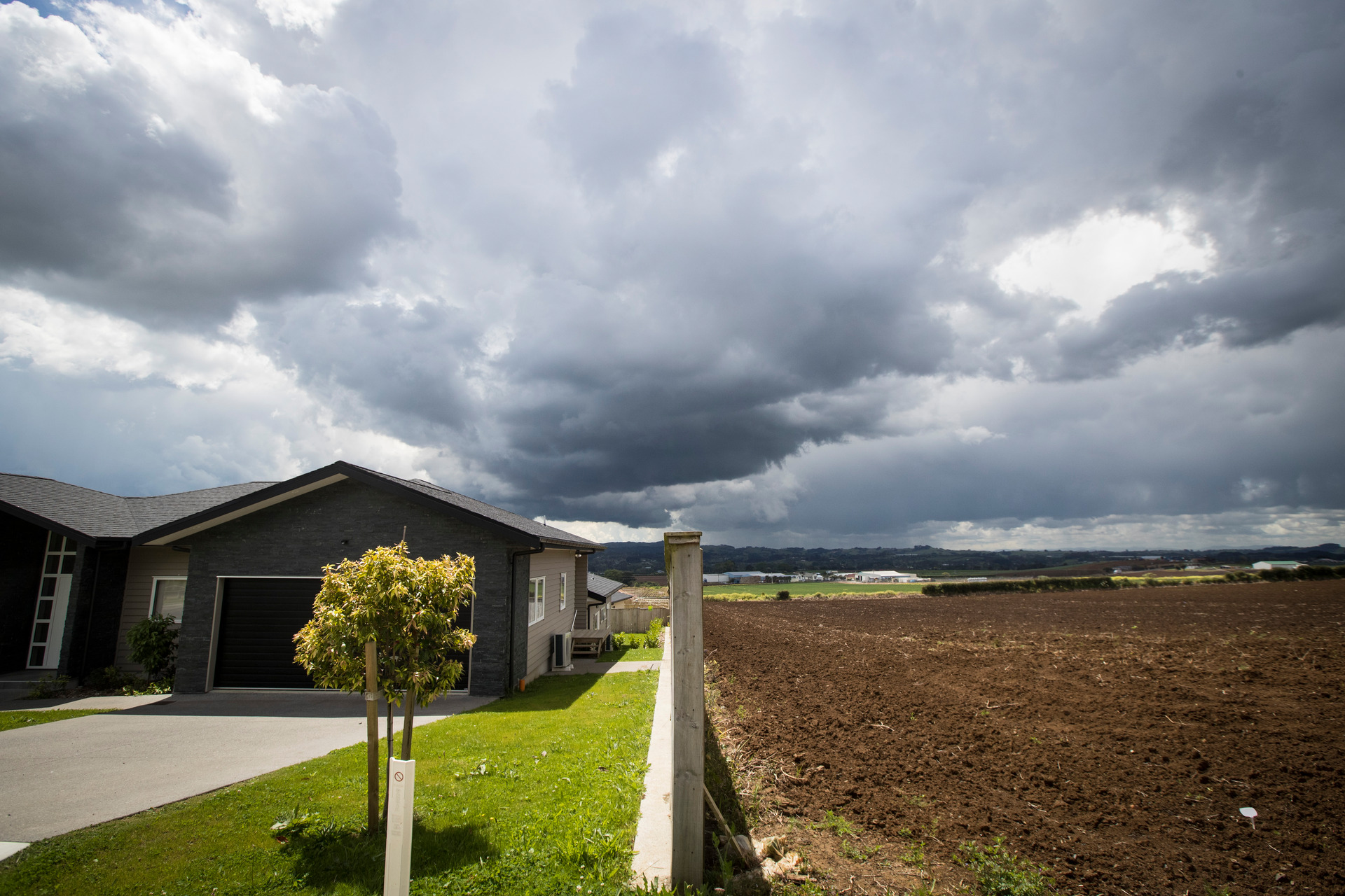 Urban growth bumps up against farmland in Pukekohe. Photo / Jason Oxenham