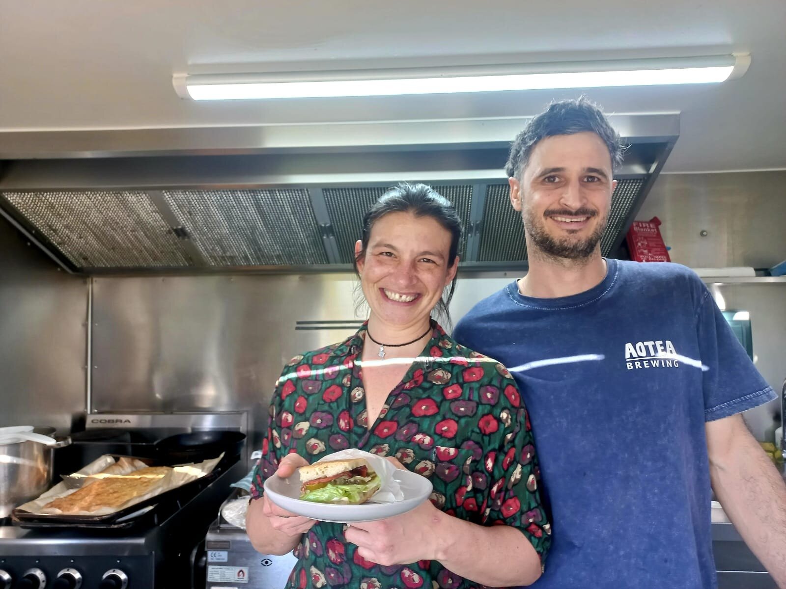 Argentinian couple Lucia Victoria and Santiago Valentin at the Good Neighbours Food Truck on Great Barrier Island. Photo / Phil Taylor