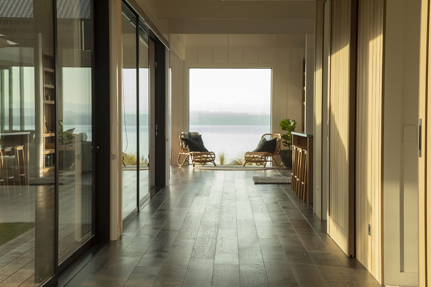 Lake Taupo glows in the backdrop of this new home. Photo / Ginny Fisher