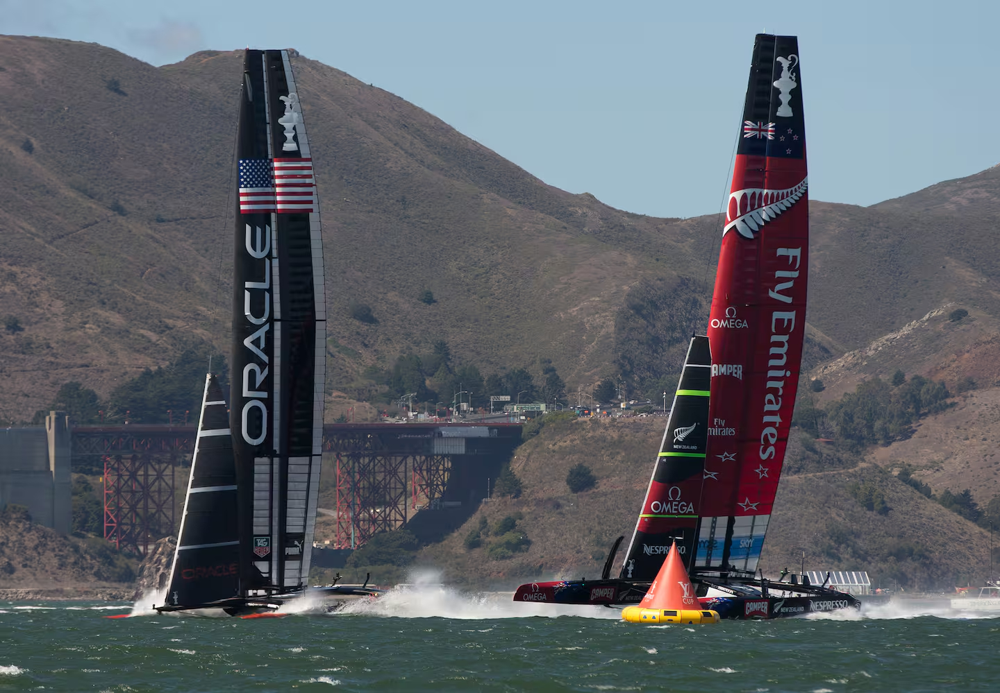 Emirates Team New Zealand and Oracle race to first mark during the 2013 America's Cup. Photo / Photosport