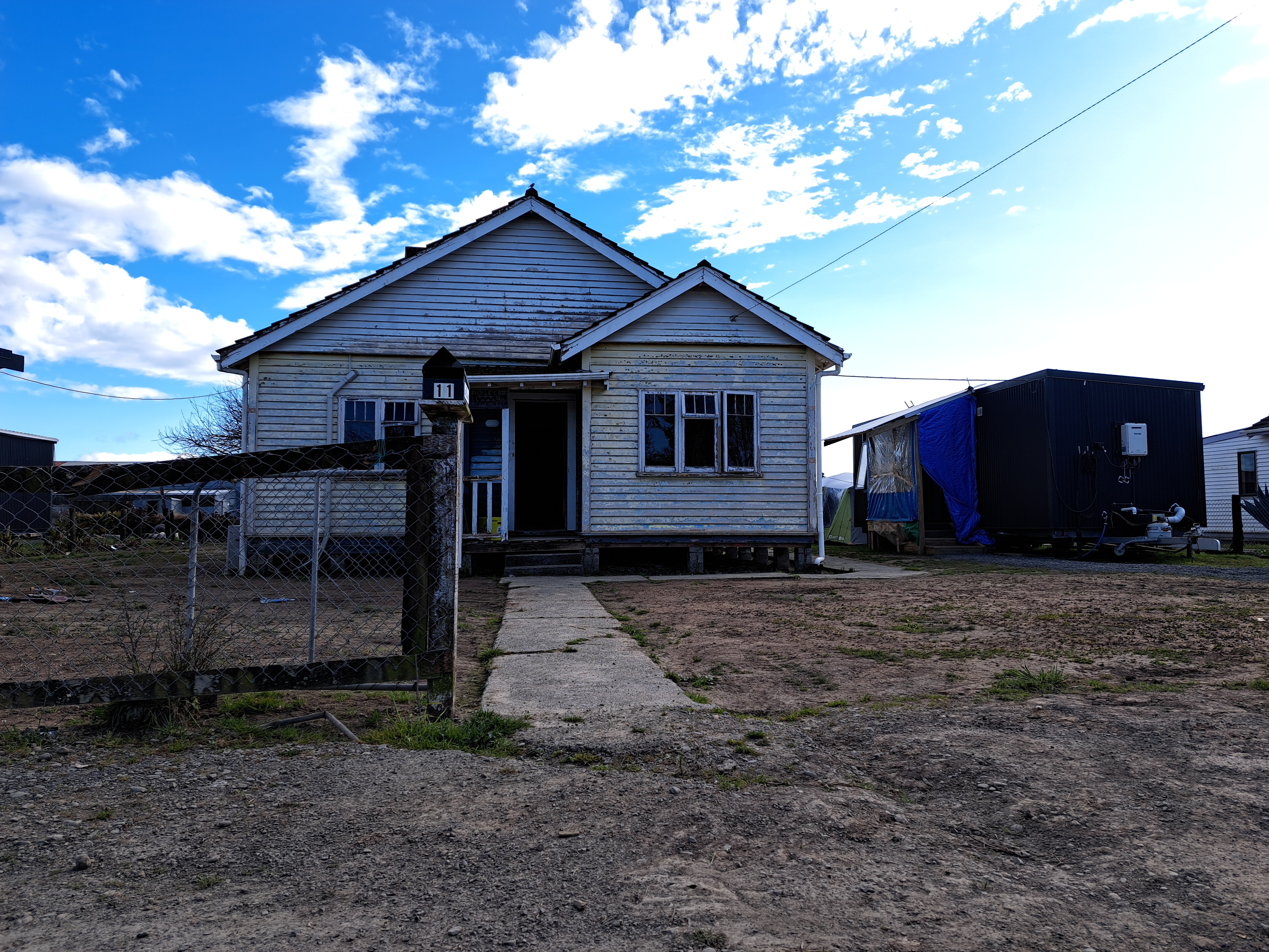 A cabin erected on Syliva Bell's property in North Clyde, Wairoa, after her house was badly damaged in Cyclone Gabrielle. Photo / Neil Reid