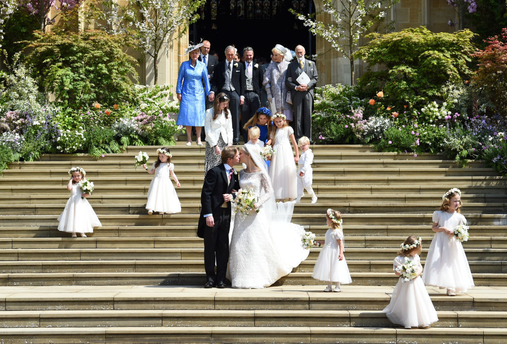 Thomas Kingston and Lady Gabriella Windsor kiss as they leave St George's Chapel. Photo / Getty Images