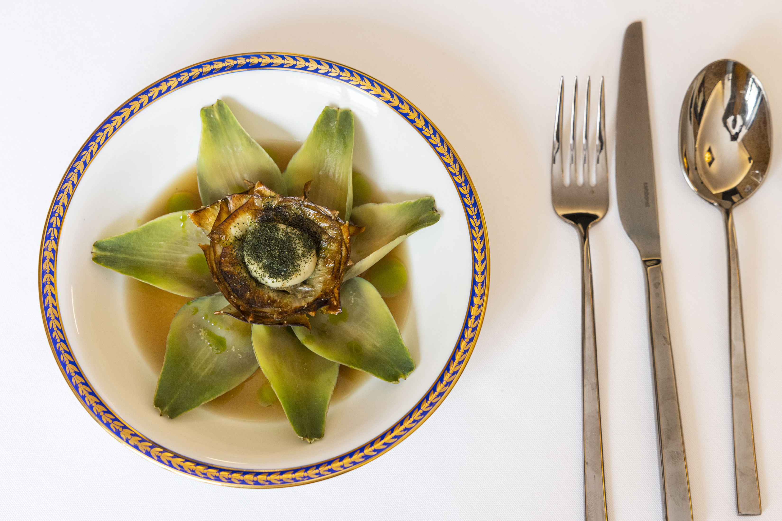 Artichoke heart filled with mountain truffle cream at Sustanza restaurant in Naples. Photo / Roberto Salomone, The New York Times
