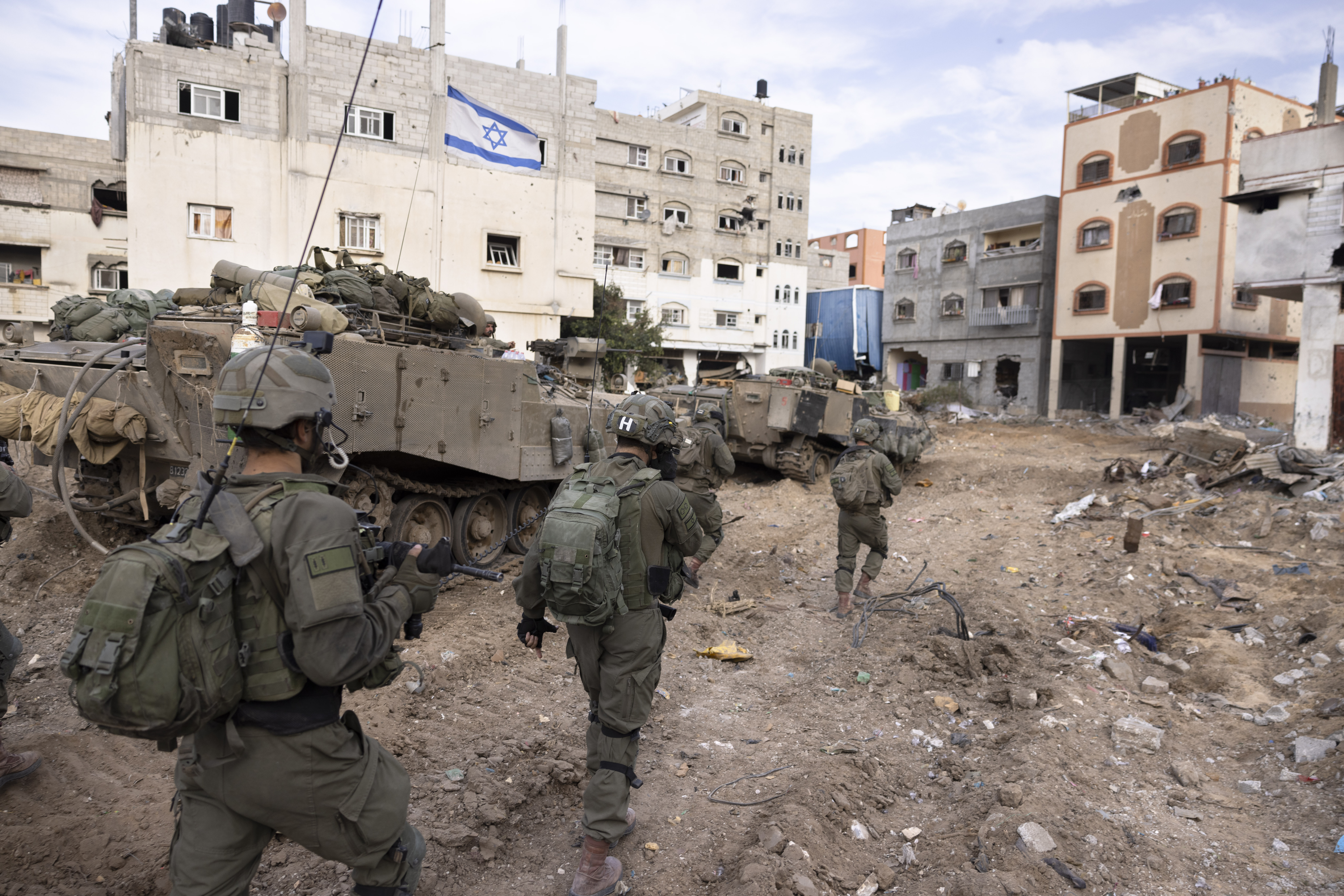Israeli soldiers take part in a ground operation in Gaza City's Shijaiyah neighborhood on December 8. Photo / AP, Moti Milrod, Haaretz