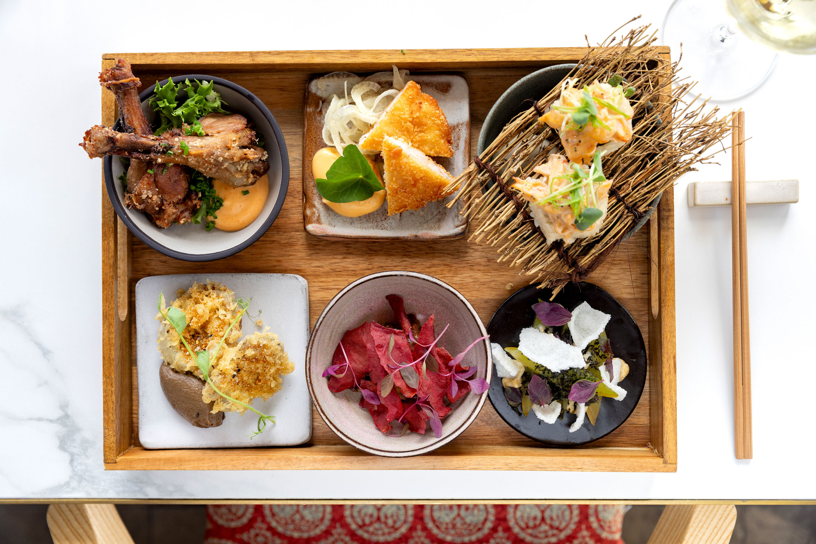 The five-entree platter on the menu at Japanese restaurant WakuWaku in Remuera. Photo / Babiche Martens
