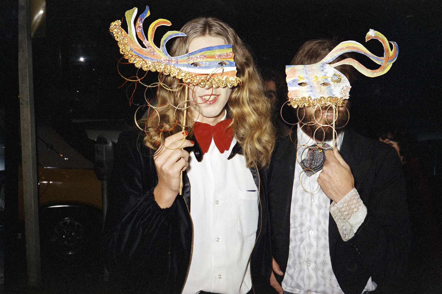 Guests arrive at the Miss NZ Drag Queen Ball, Auckland, 1975. Photo / Fiona Clark