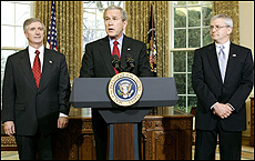 President George W. Bush (C) announces the resignation of his Chief of Staff Andrew Card (L) and names Josh Bolten (R) as Card's replacement. Picture / Reuters