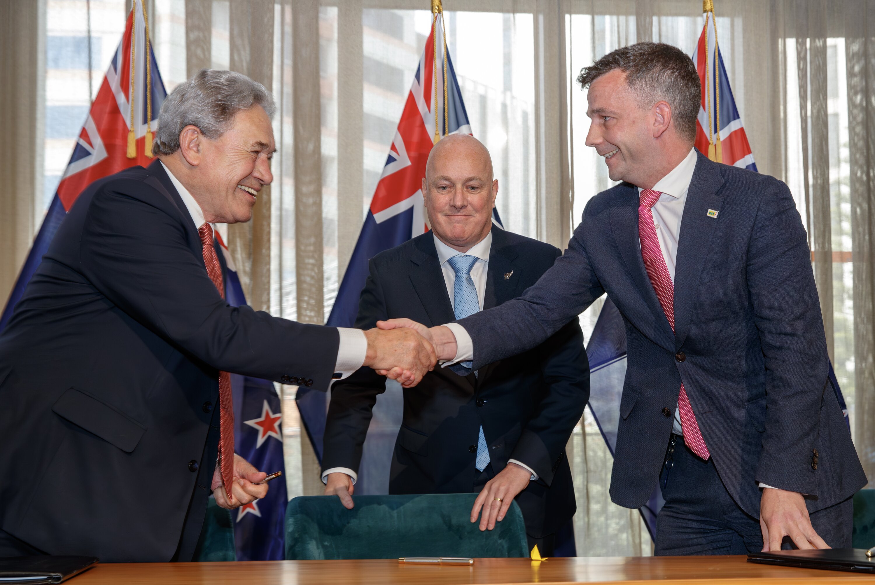 The day the coalition's deals were done in November last year. New Zealand First leader Winston Peters (from left), Prime Minister Christopher Luxon and Act leader David Seymour. Photo / Mark Mitchell