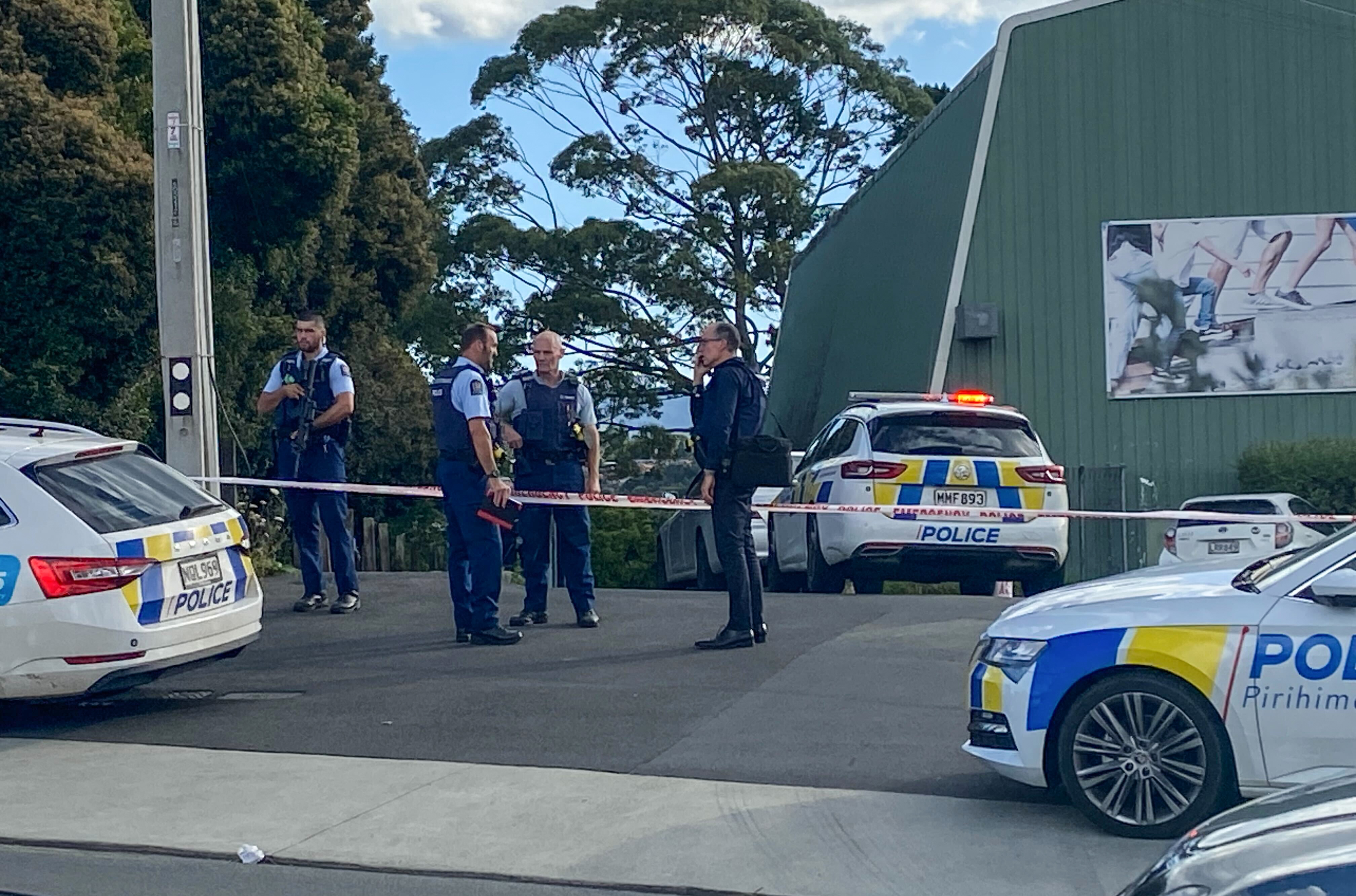 Police gather after Yaqubi was stabbed to death. Photo / Lincoln Tan