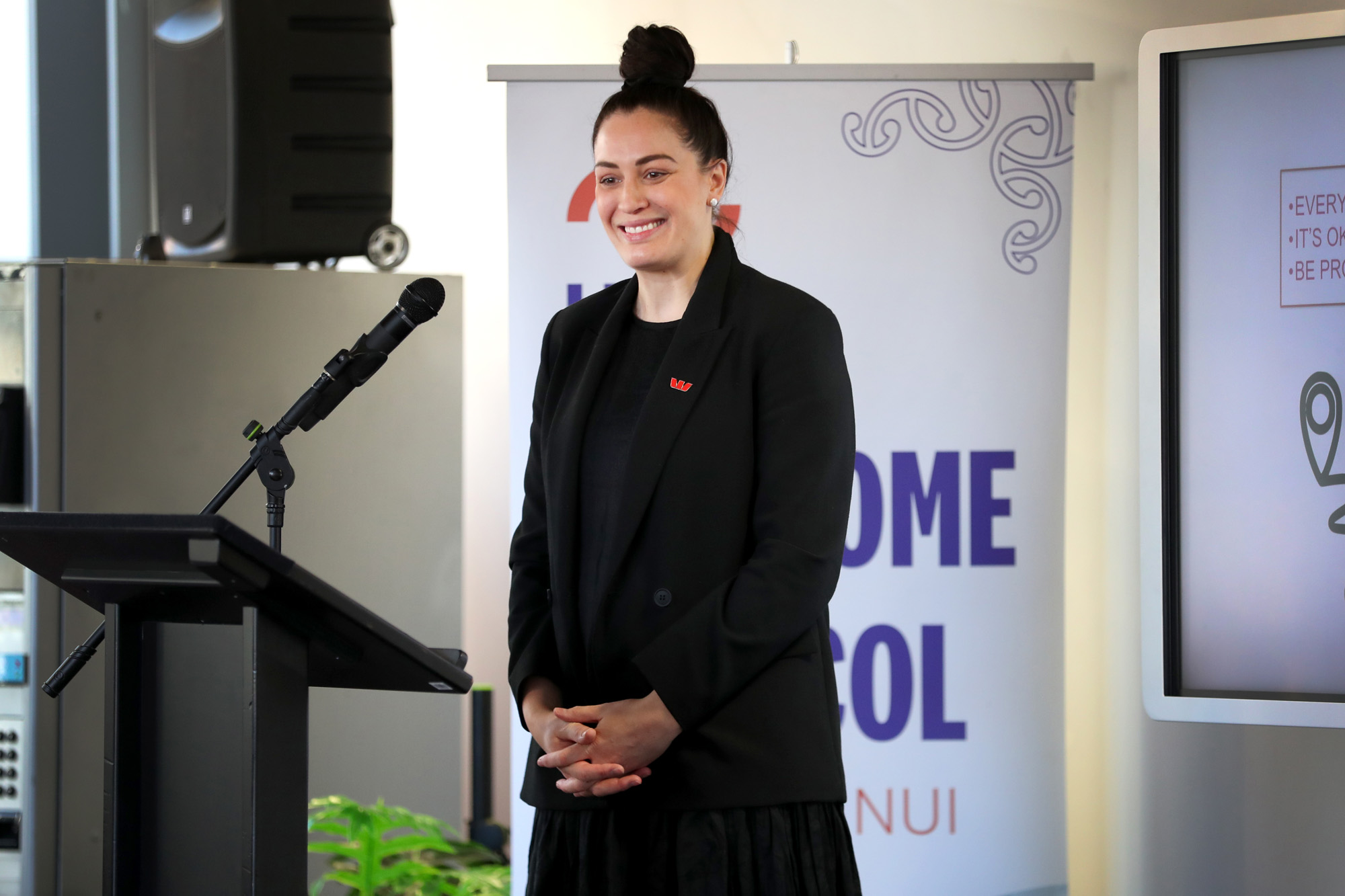 Dame Sophie Pascoe on stage speaking to students from schools around Whanganui at UCOL Te Pūkenga. Photo / Bevan Conley