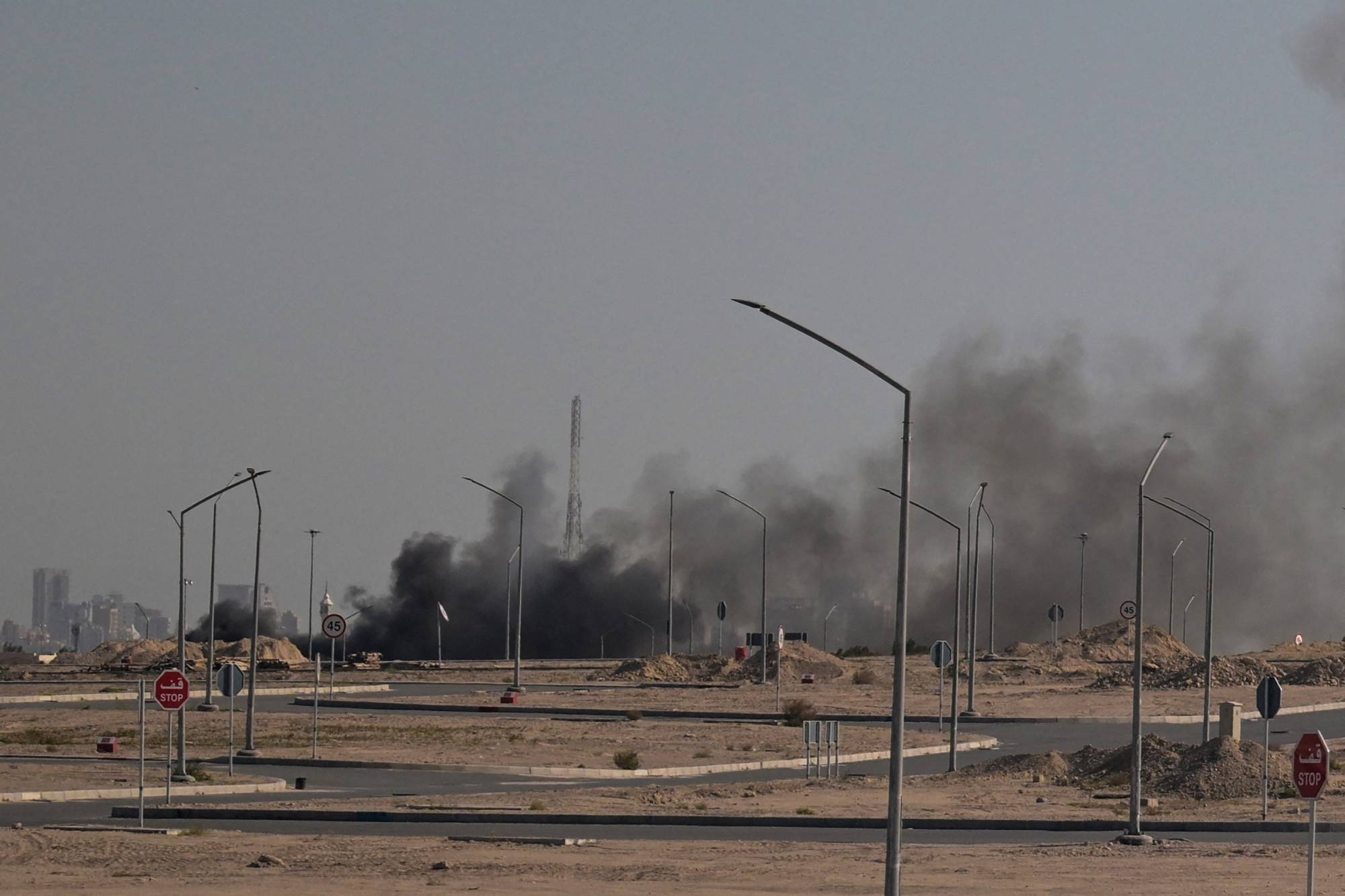 Smoke rises from a reported Iranian strike in the area where the US Embassy is located in Kuwait City on March 2, 2026. Photo / AFP