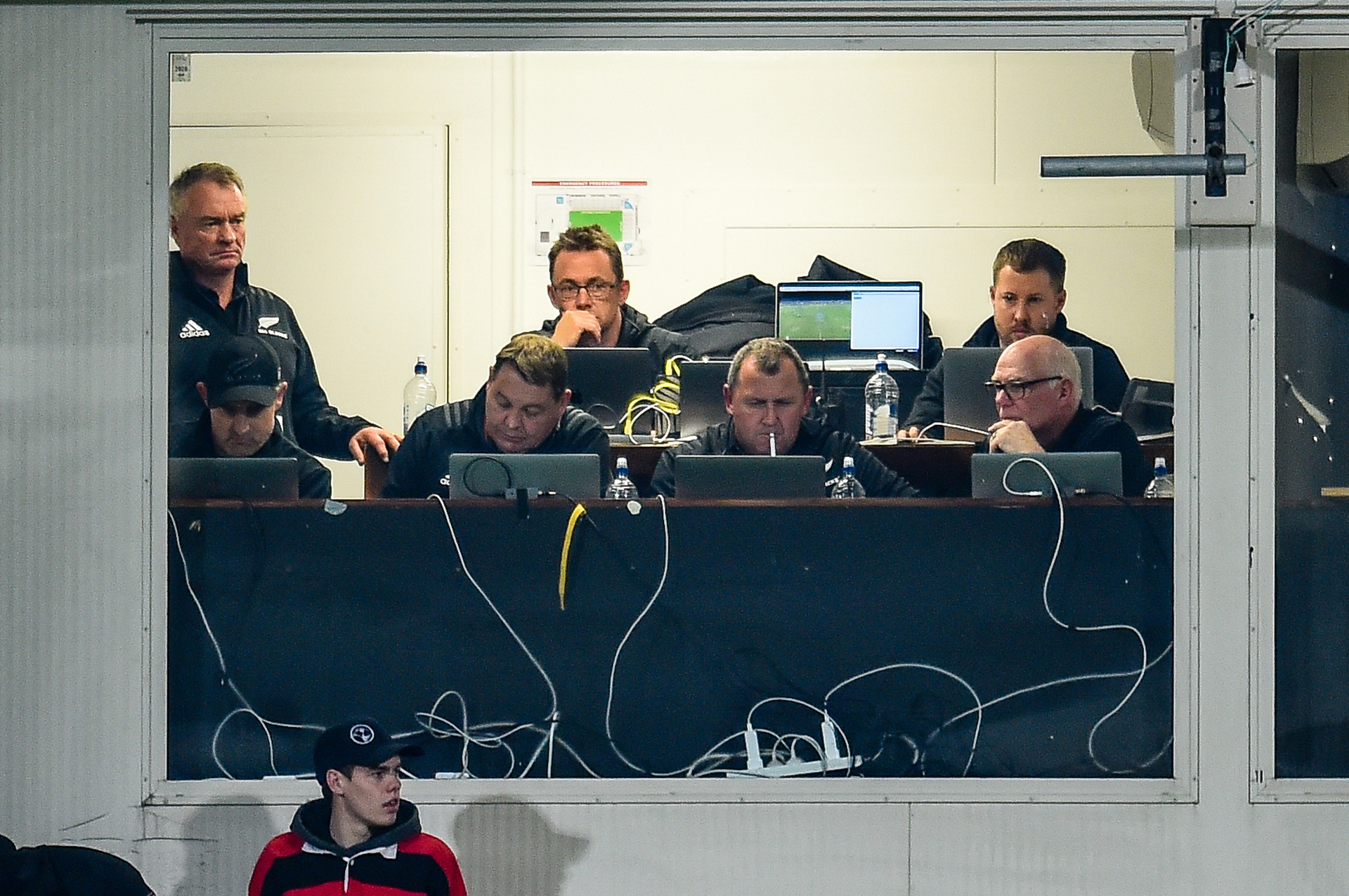 Grant Fox, Scott McLeod, Steve Hansen,  Ian Foster and Mike Cron in the All Black coaching box during a practice match in 2018. Photo / Photosport