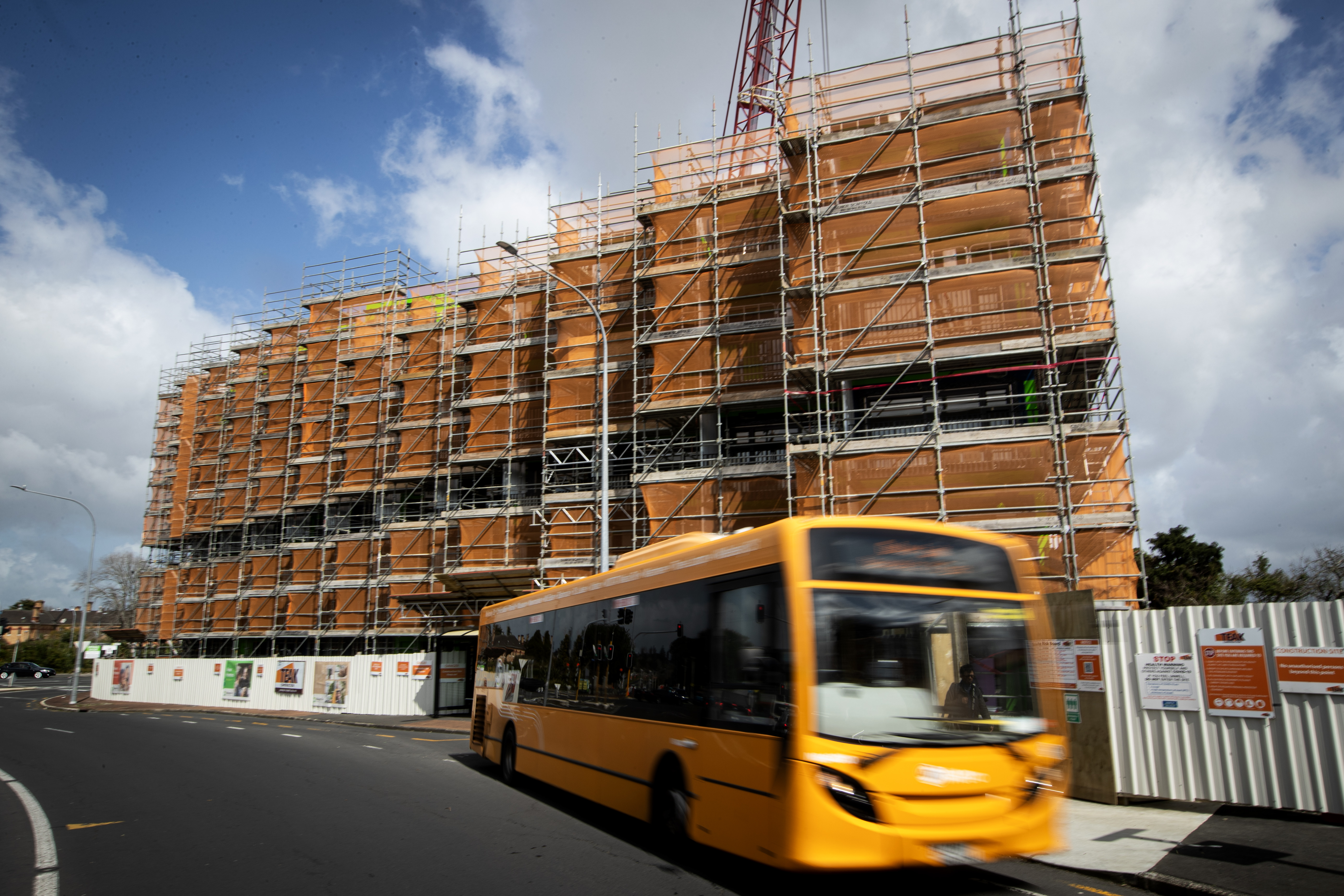 A crane on the site hauled units imported from China into place. Photo / Jason Oxenham