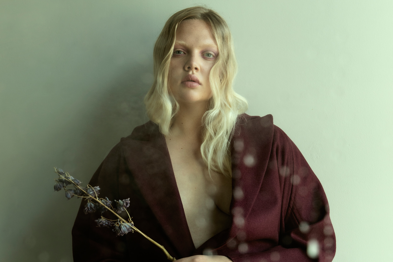 Holly Rose Emery wears a coat by New Zealand label Harris Tapper. Photo / Guy Coombes.