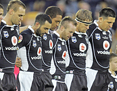 The Warriors line up for a moment's silence in honour of Sonny Fai. Photo / NZME