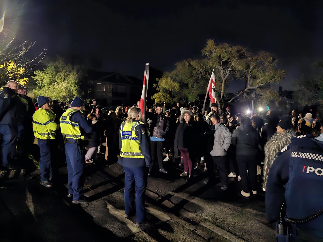 Protesters outside the private residence in Havelock North that hosted Julian Batchelor's Stop Co-Governance meeting on Wednesday. Photo / Howard McGuire