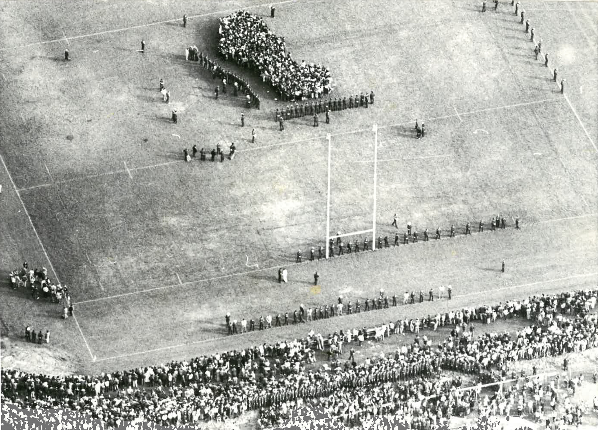 Springbok Tour 1981
Aerial view of Rugby Park Hamilton 25 July 1981 with 300 anti-tour protesters on the field surrounded by police ahead of the Waikato v South Africa game, which was abandoned. Photo / Peter Drury