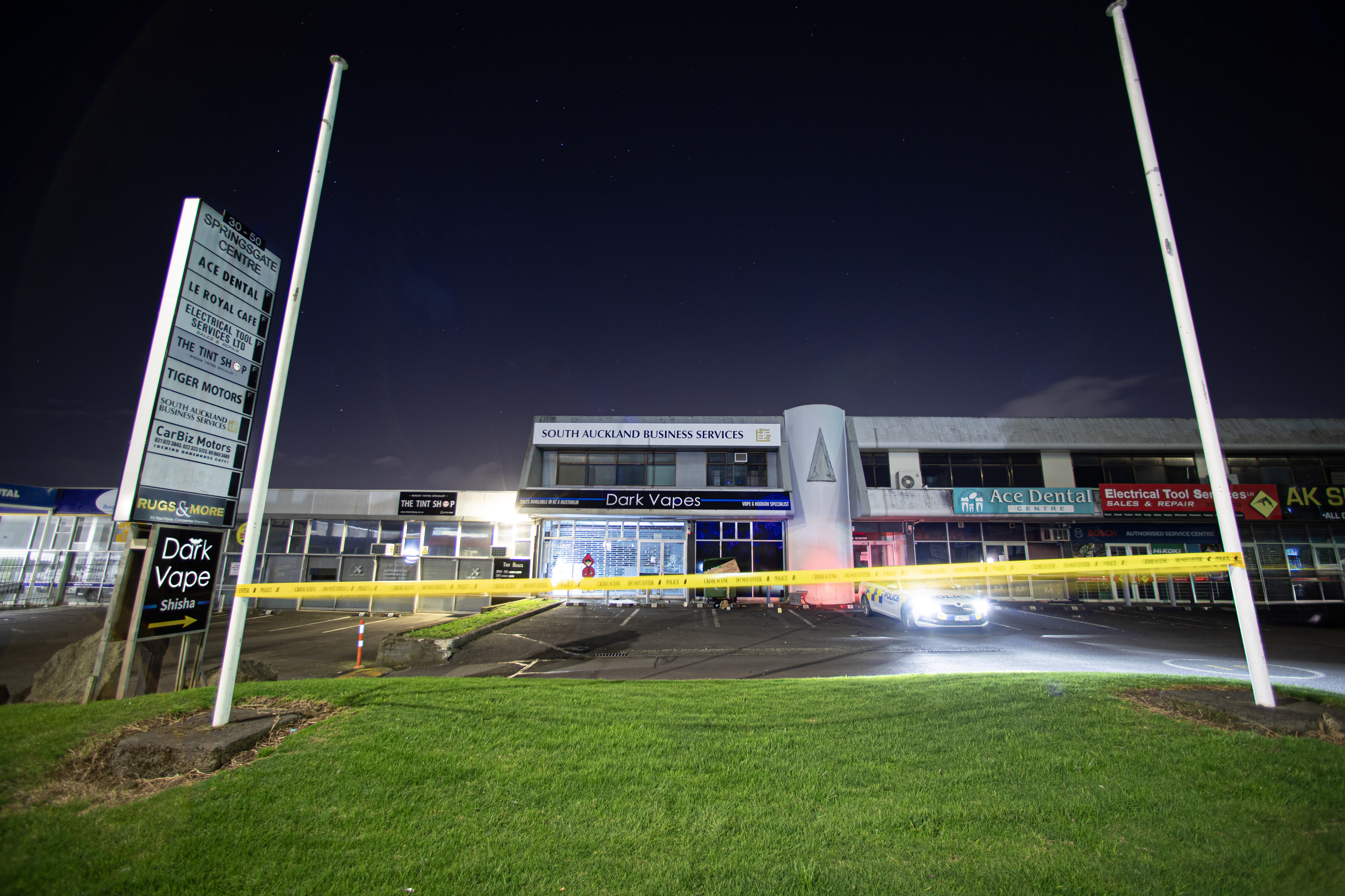 Large rocks were found outside the Dark Vapes shop in East Tamaki, Auckland, overnight. Photo / Hayden Woodward