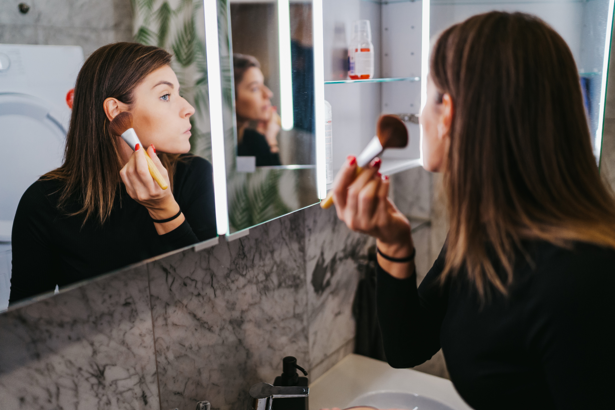 It's tempting to go for a different shade of makeup than your natural colour. Photo / Getty Images