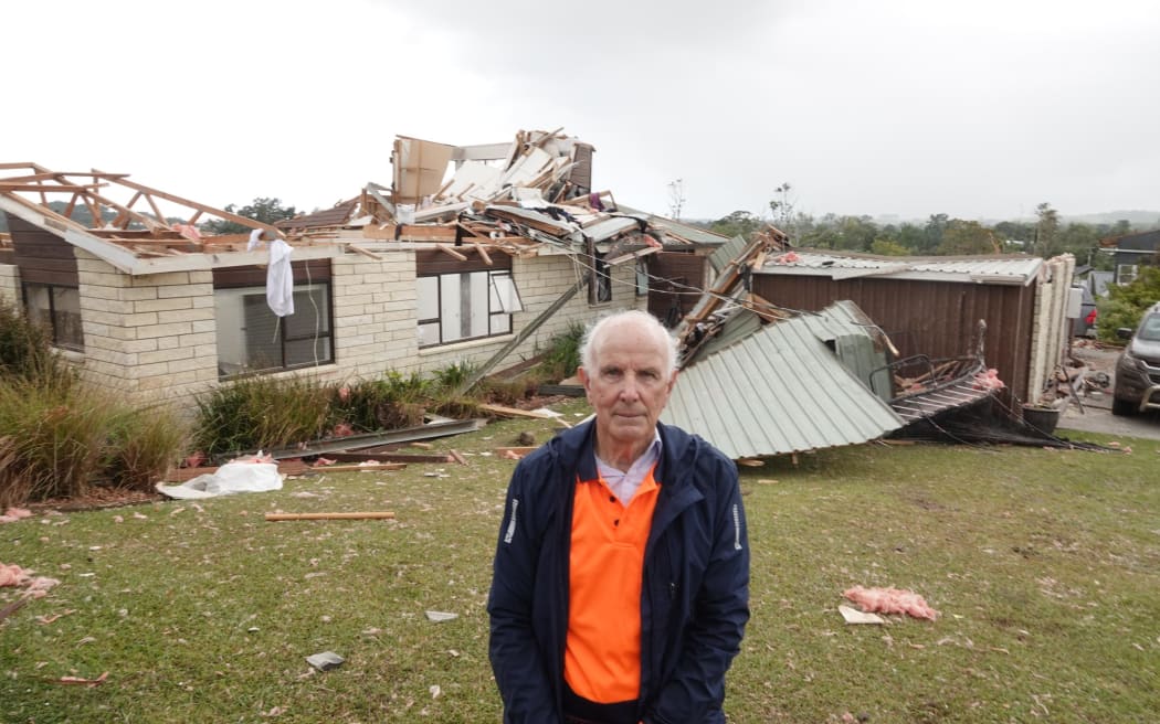 Alan Johnson in front of his Old Waipu Road home. Photo / Peter de Graaf, RNZ