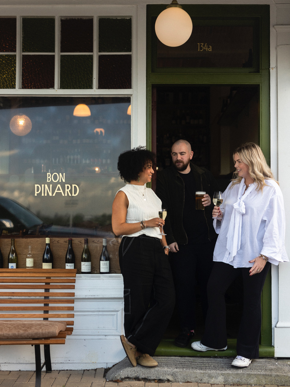 Bon Pinard is a new French-style wine bar in Birkenhead, opened by Jordan and Sarah MacDonald, pictured with front of house Olivia Douglas. Photo / Alex McVinnie