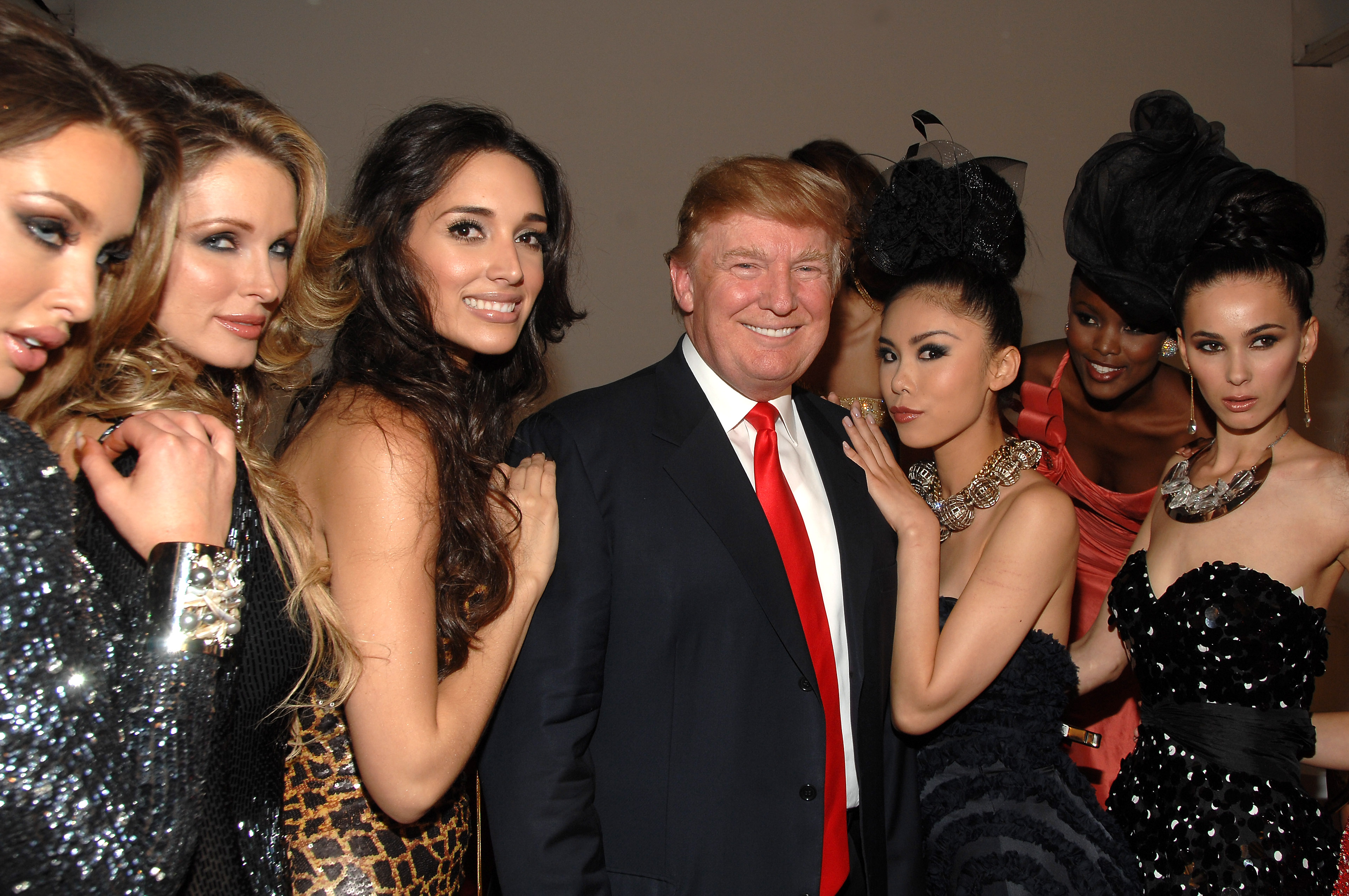 Donald Trump with some Miss Universe contestants. Photo / Getty Images
