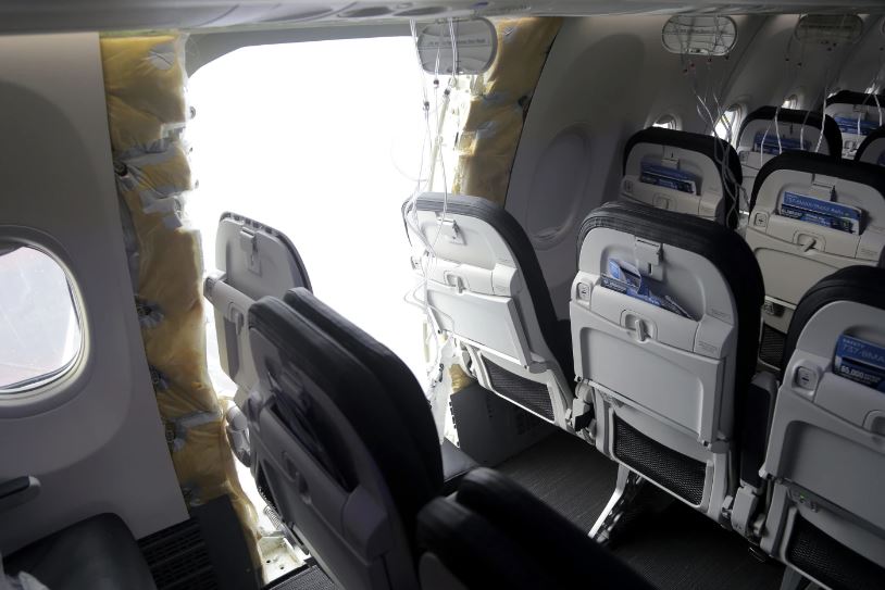 This photo released by the National Transportation Safety Board shows a gaping hole where the panelled-over door had been at the fuselage plug area of Alaska Airlines Flight 1282, pictured on January 7, 2024, in Portland, Oregon, US. The US Department of Justice has launched a criminal investigation into the blowout. Photo / National Transportation Safety Board via AP, file