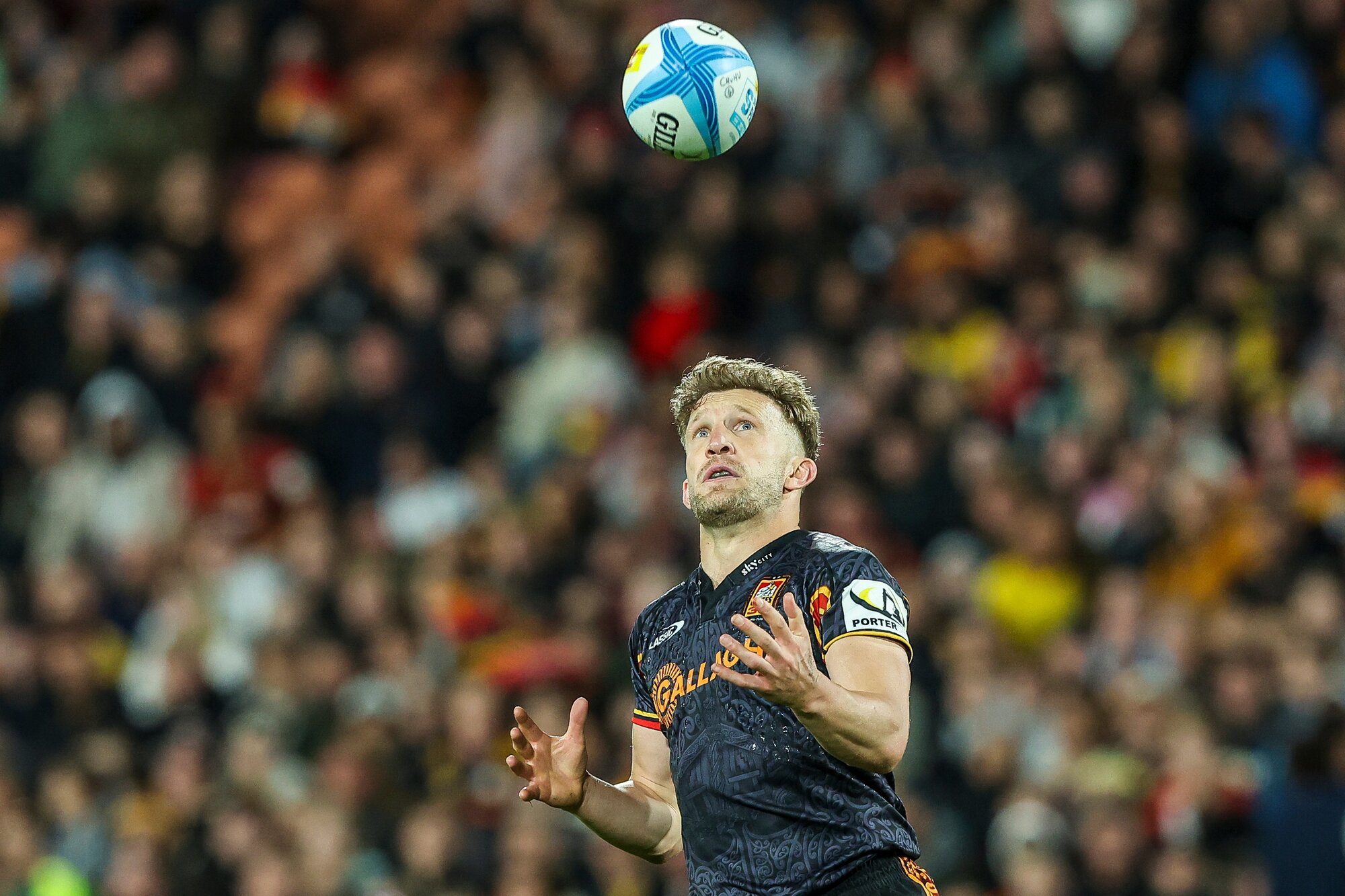 Chiefs playmaker Damian McKenzie prepares to catch the ball in Saturday's match against the Hurricanes. Photo / Photosport