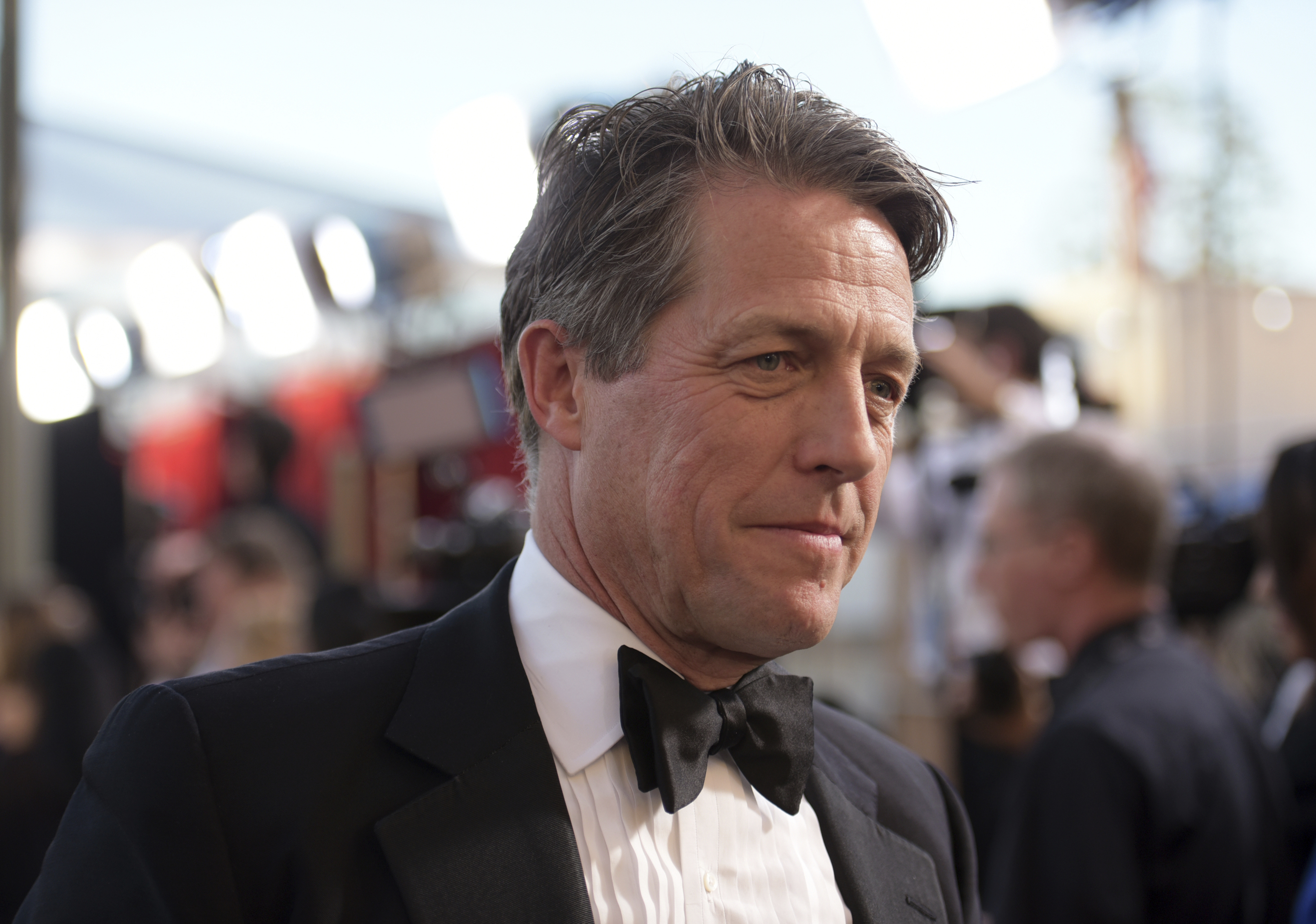 A London court on Friday rejected an attempt by the publisher of The Sun tabloid to throw out a lawsuit by actor Hugh Grant alleging that journalists and investigators it hired illegally snooped on him. Photo / AP