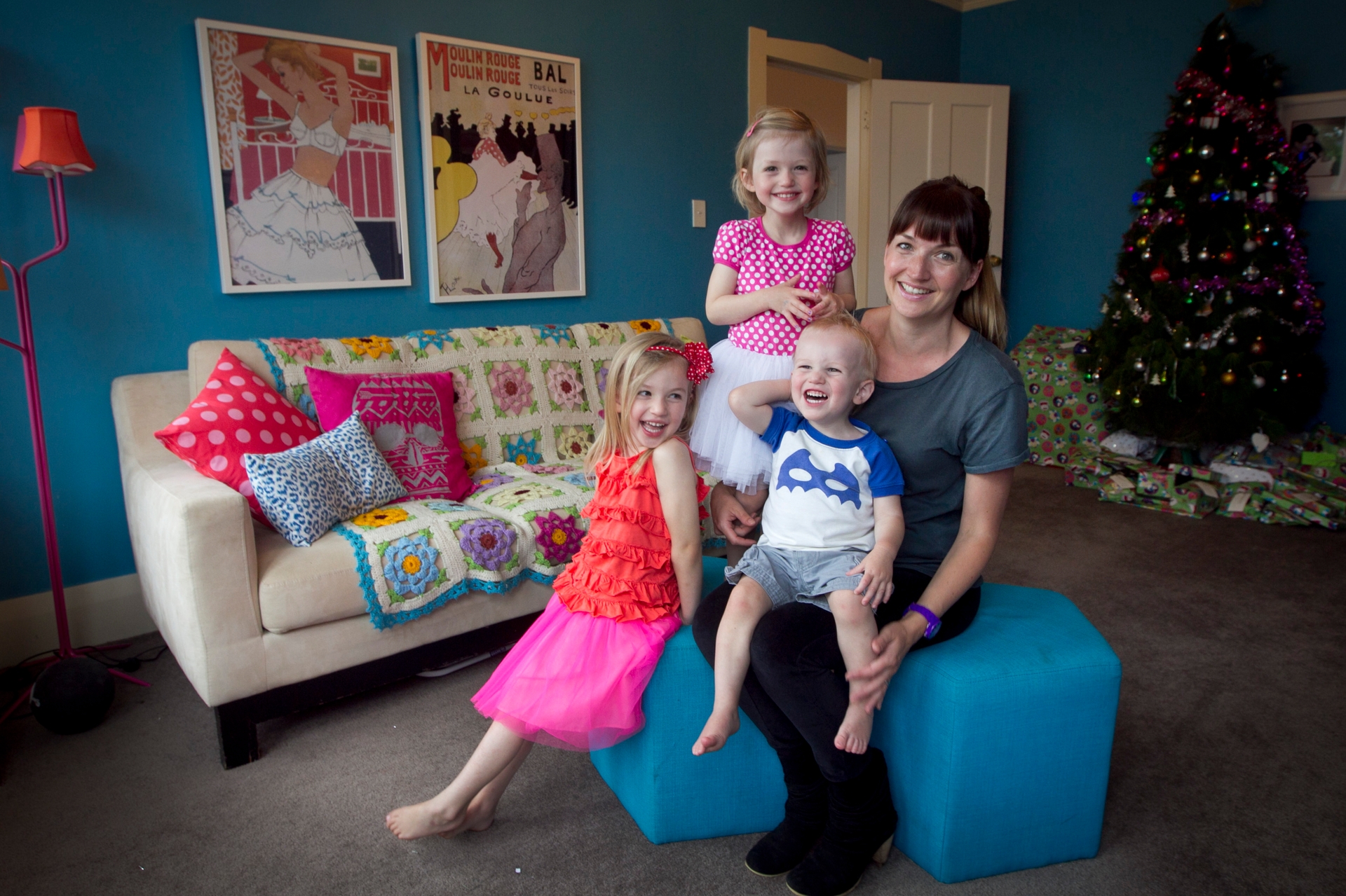 Annick Larkin with Lottie, Esther and Tom in the room where the murders took place. Mrs Larkin and husband Tim are not bothered by the house's gruesome past. Photo / Natalie Slade