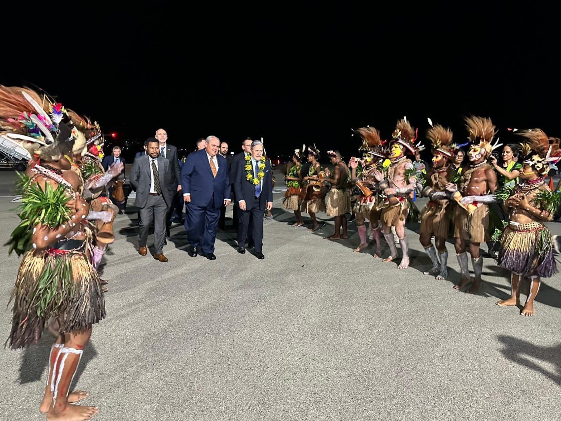 A NZ ministerial delegation, led by Deputy PM Winston Peters, are welcomed to Port Morseby, Papua New Guinea, last night. They are joined by PNG Foreign Affairs Minister Justin Tkatchenko. Photo / MFAT