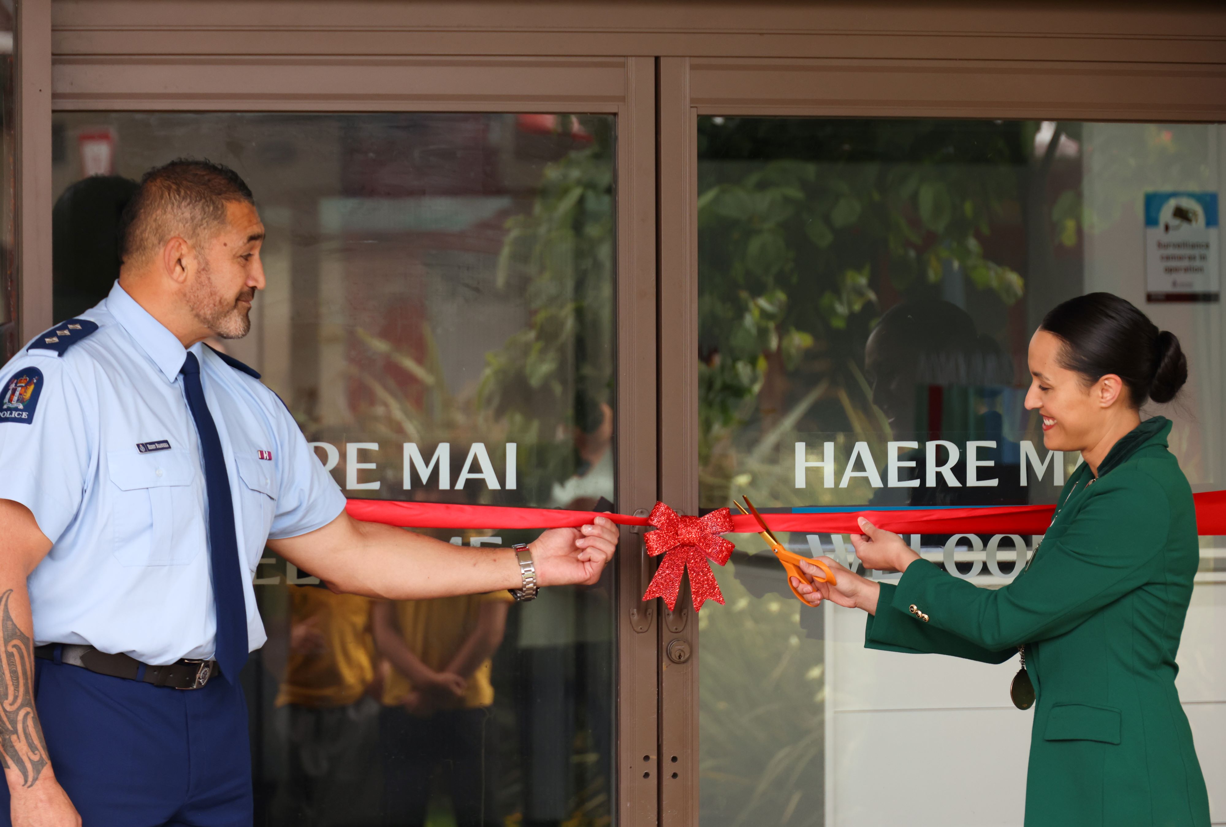 Rotorua area commander inspector Herby Ngawhika (left) and Rotorua Mayor Tania Tapsell cutting the ribbon at the new Rotorua Inner City Community Safety Hub. Photo / Rotorua Lakes Council