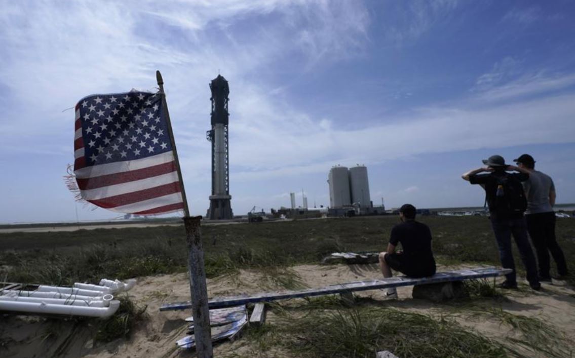 Onlookers watch as SpaceX's Starship stands ready for launch in Boca Chica, Texas. Photo / AP