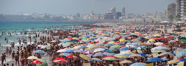 Colorful umbrella's on a beach in Playa de la Victoria, Cadiz.