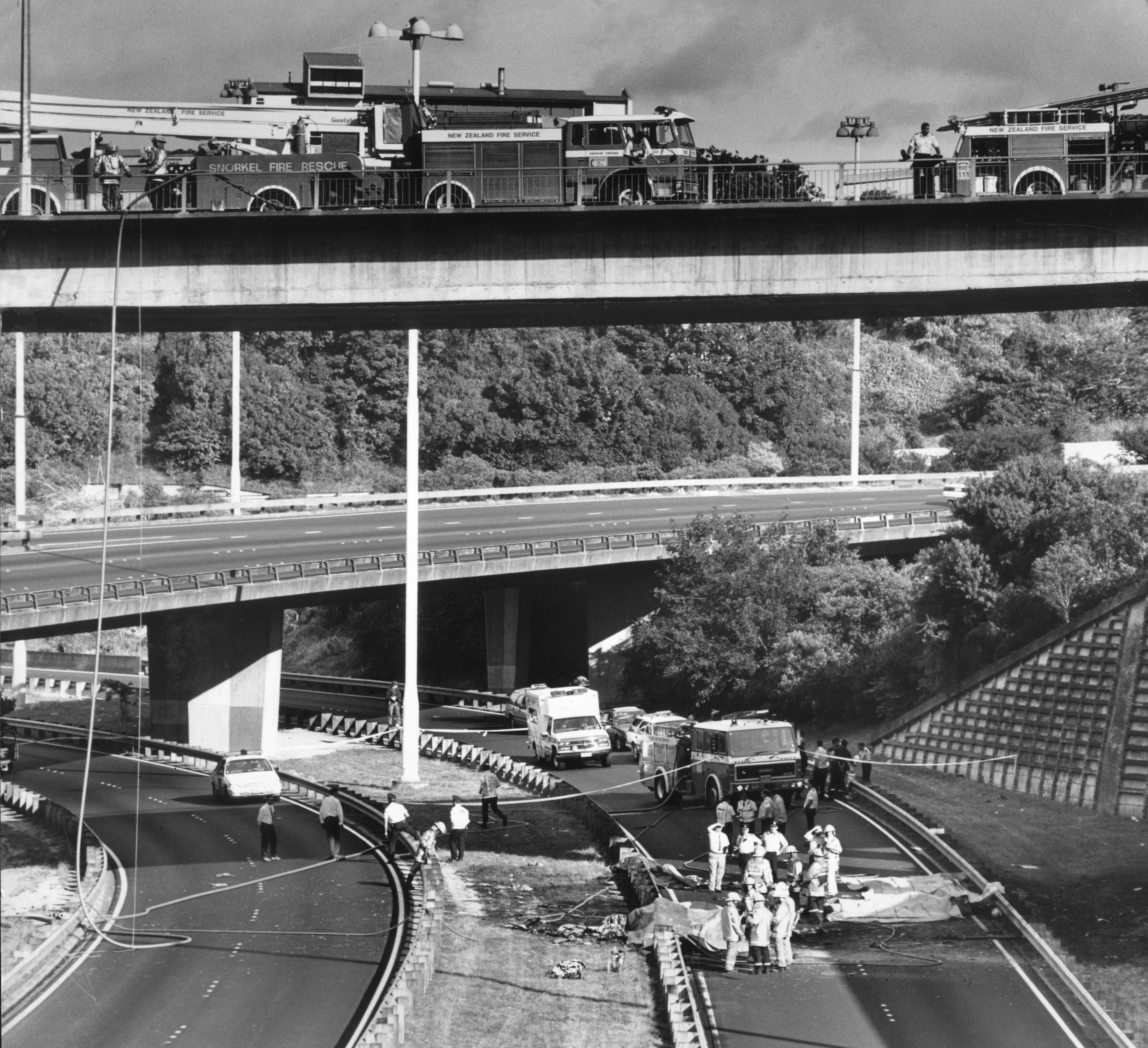 The wreckage of the police helicopter Eagle under the Symonds St motorway bridge. Photo / NZ Herald archives