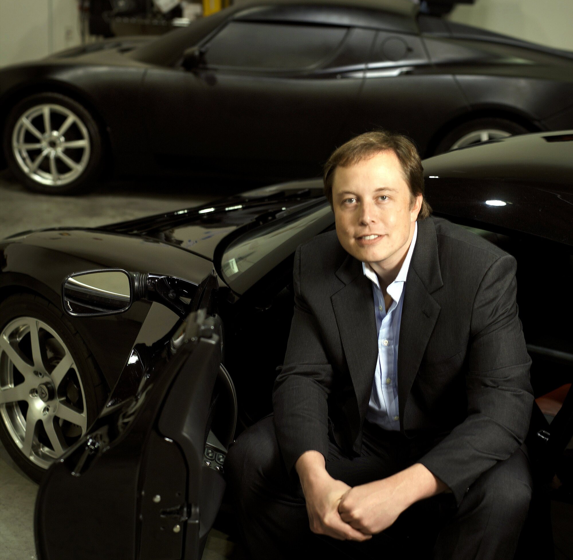 Elon Musk with a Tesla: the business opens a huge new Westgate outlet soon. Photo / Getty Images