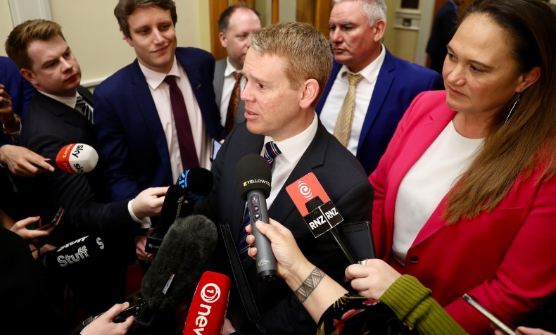Labour leader Chris Hipkins speaks to reporters after a caucus meeting to farewell MPs who have lost their jobs. Photo / George Heard