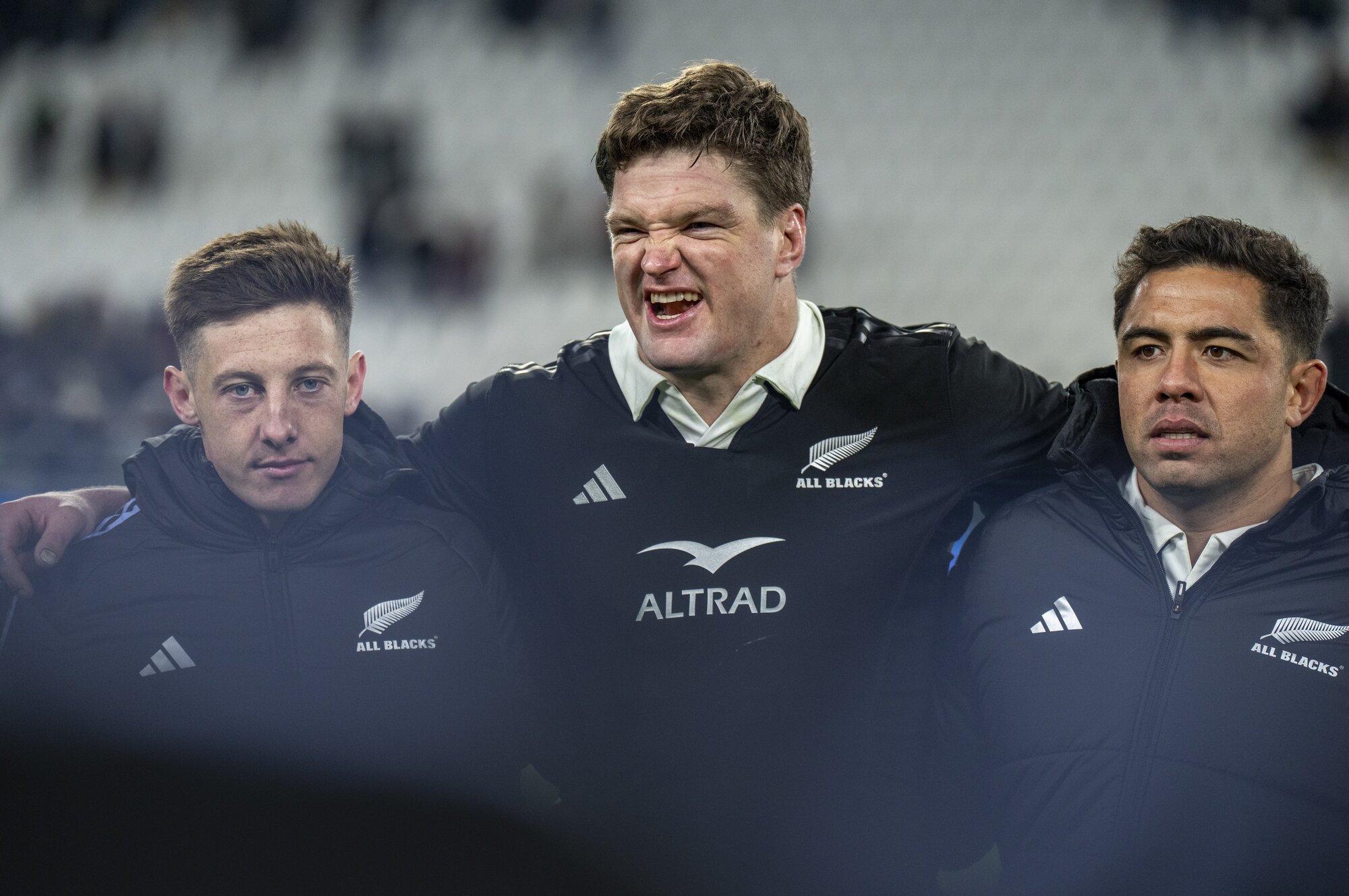 All Blacks captain Scott Barrett leads a team huddle after the All Blacks beat Italy in their final match of 2024. Photo / SmartFrame
