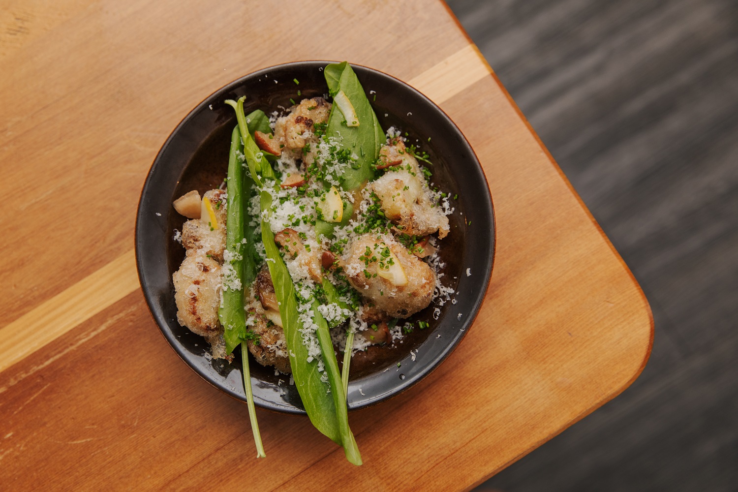Crispy cauliflower with gouda custard, black walnut ketchup and sorrel. Photo / Nancy Zhou