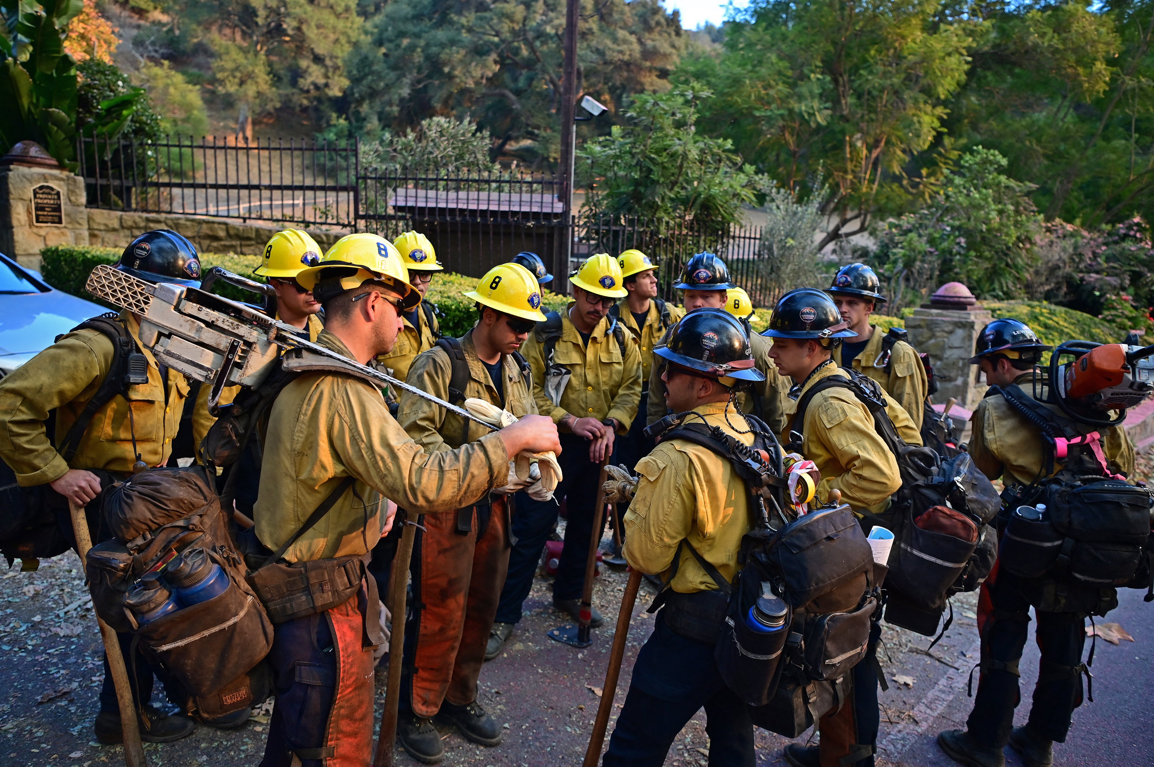 Firefighters on the weekend as the Palisades fire, the largest of the Los Angeles wildfires, spread toward previously untouched areas, forcing new evacuations. Photo / Agustin Paullier, AFP