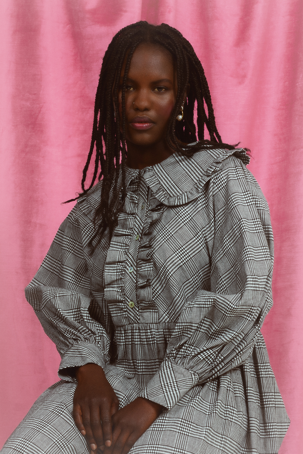 Ayak wears a Twenty-seven Names dress and Meadowlark pearl hoop earrings. All other earrings model’s own. Photo / Mia Vinaccia