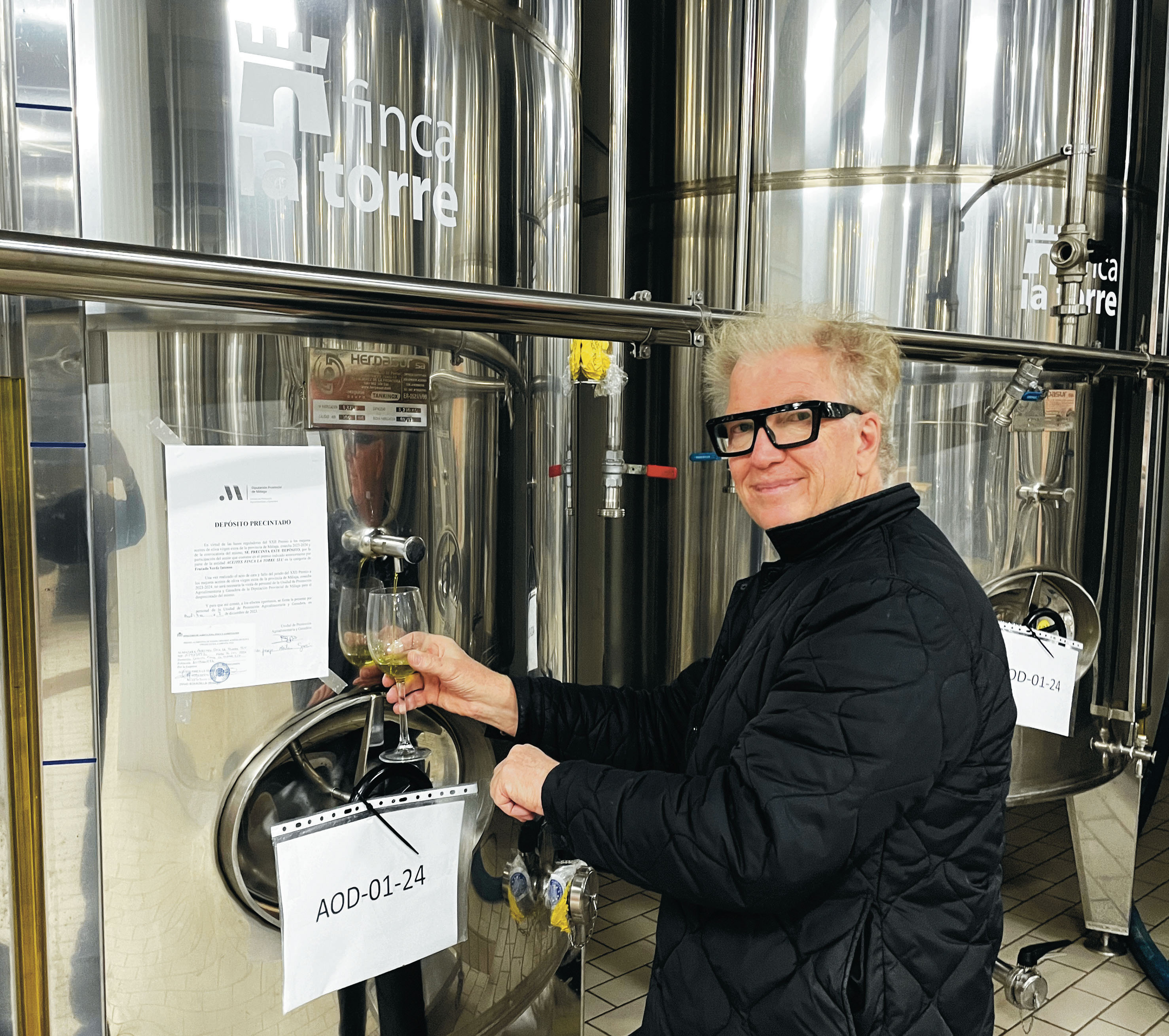 Michael Lamb sampling extra virgin olive oil at Finca La Torre.