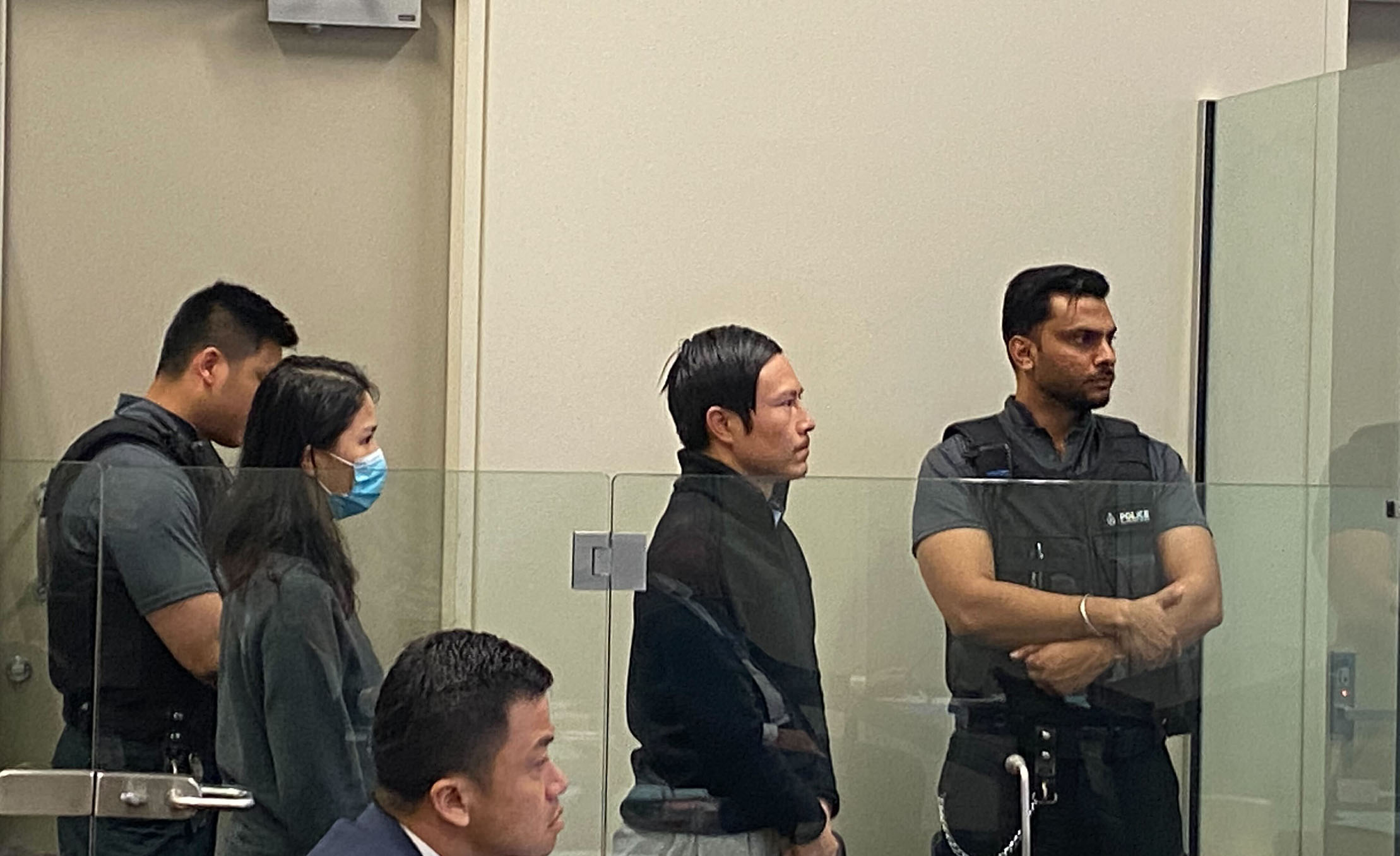 Kaixiao Liu, right, and wife Lanyue Xiao appear in North Shore District Court on November 8, 2024, after they were charged with the manslaughter of Shulai Wang. Photo / George Block