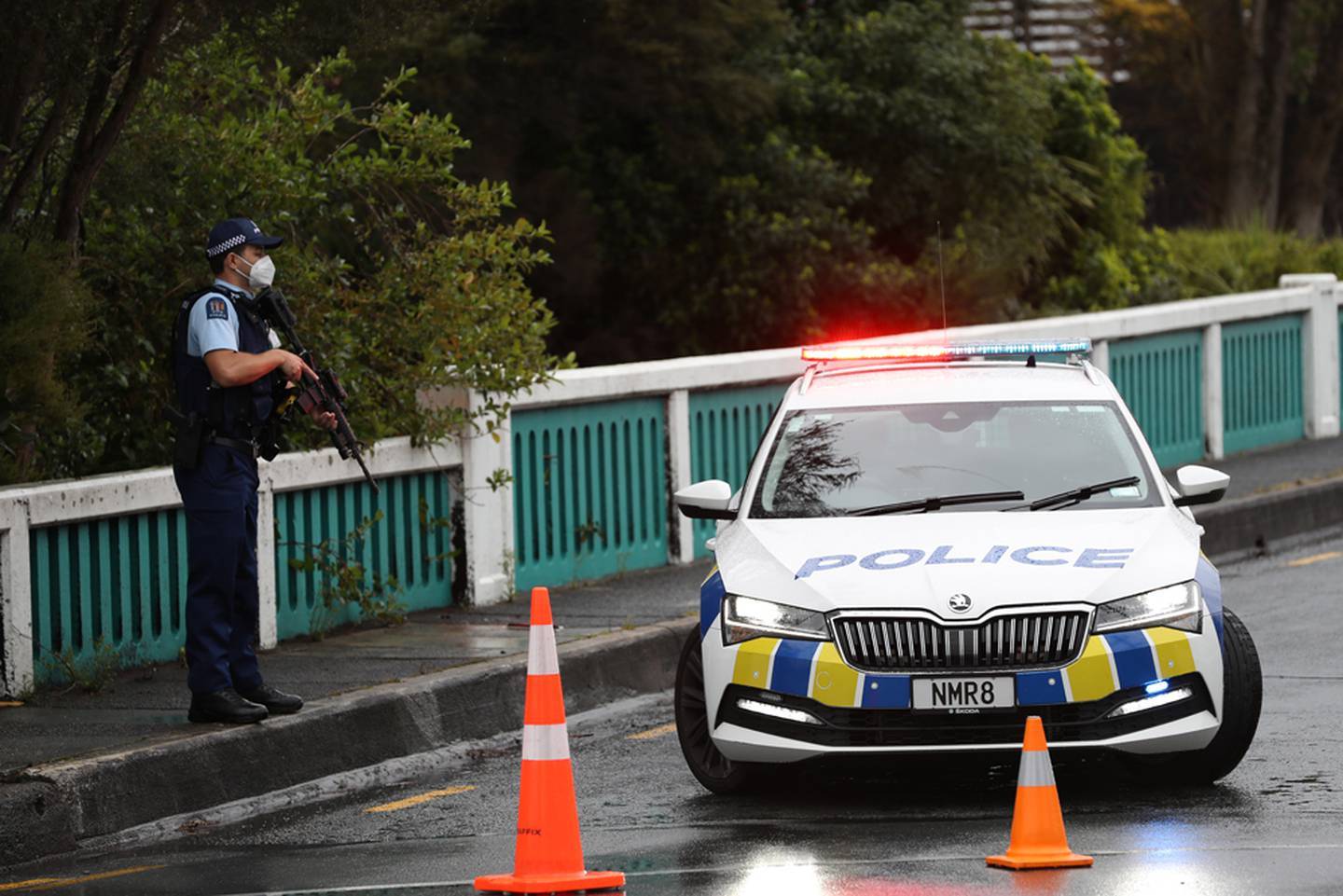 Armed police have surrounded the Head Hunters' gang headquarters on October 17. Photo / Hayden Woodward